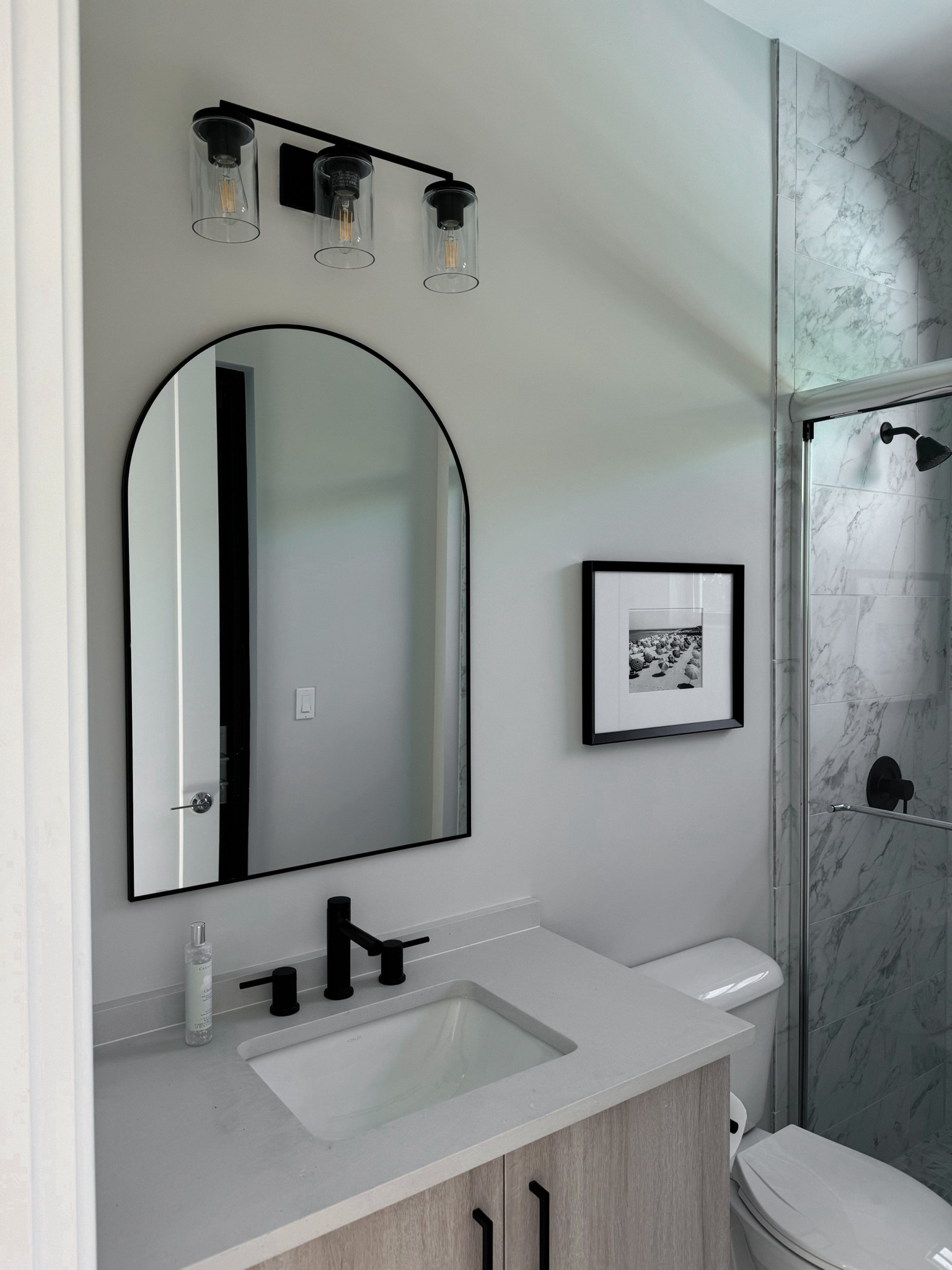 Our cabana bath is complete. Light / mirror installed, photo frame hung, and painted Egret White 

#LTKhome