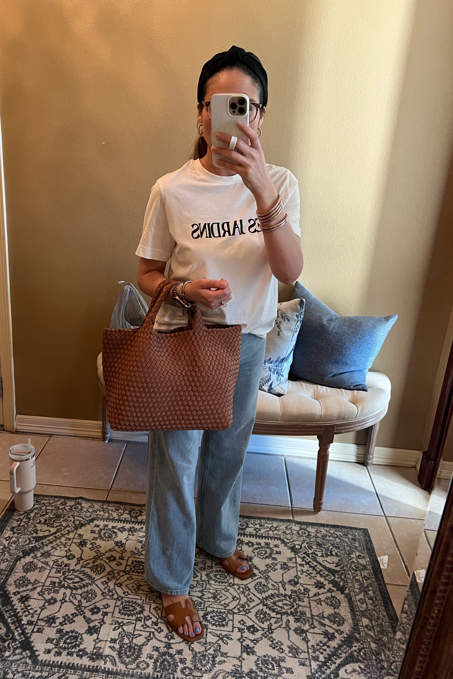 Running errands outfit 
Wide leg jeans
Les jardines t shirt
White tee
Word graphic
Steve Madden H hadyn sandals SALE
Cognac
St Barths tote medium
Cocoa
Woven bag 
Budhagirl bangles
Champagne 
Two tone Apple Watch band

#LTKitbag #LTKshoecrush #LTKsalealert