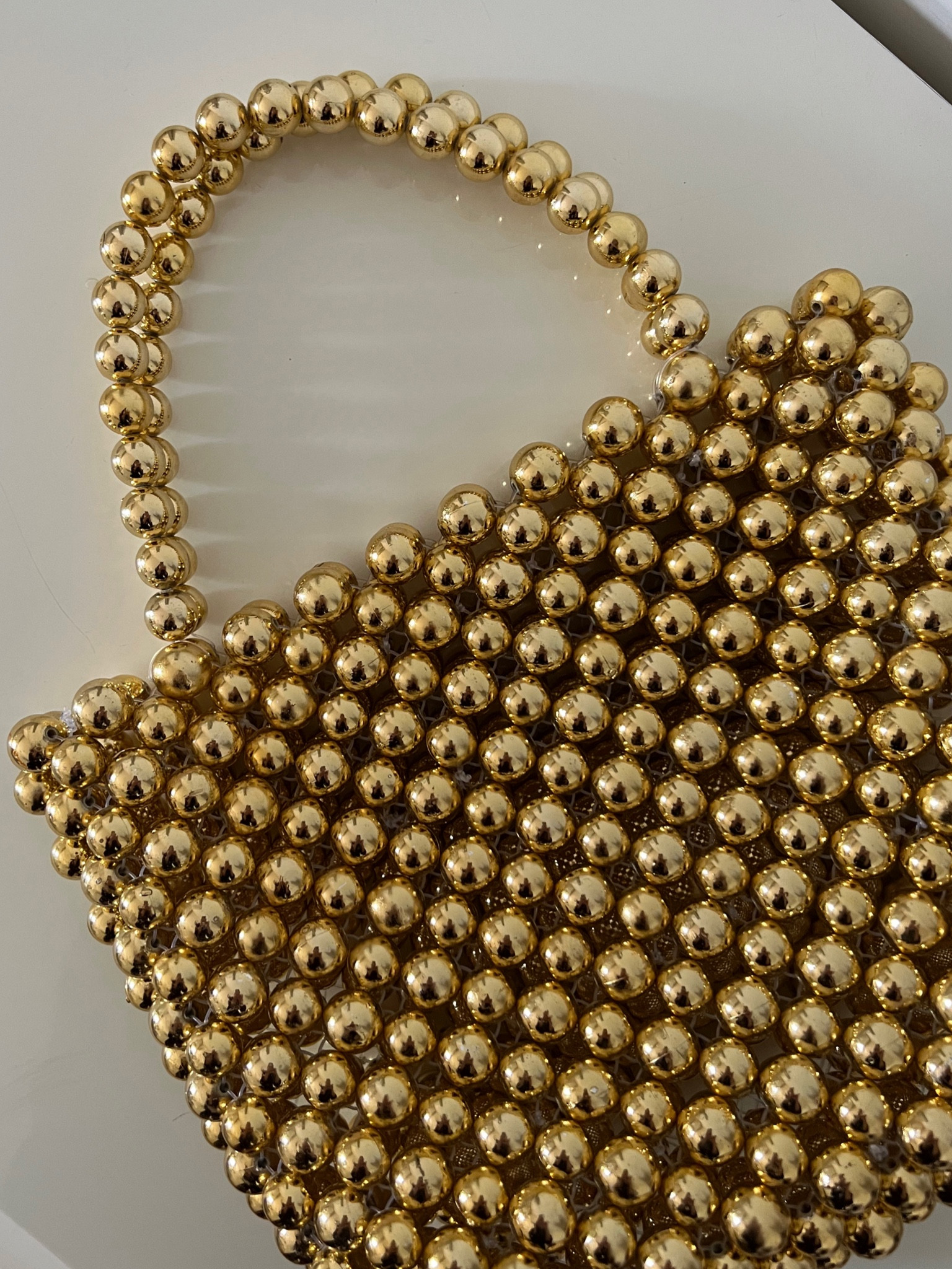 Gold Bag 

#LTKeurope #LTKGiftGuide