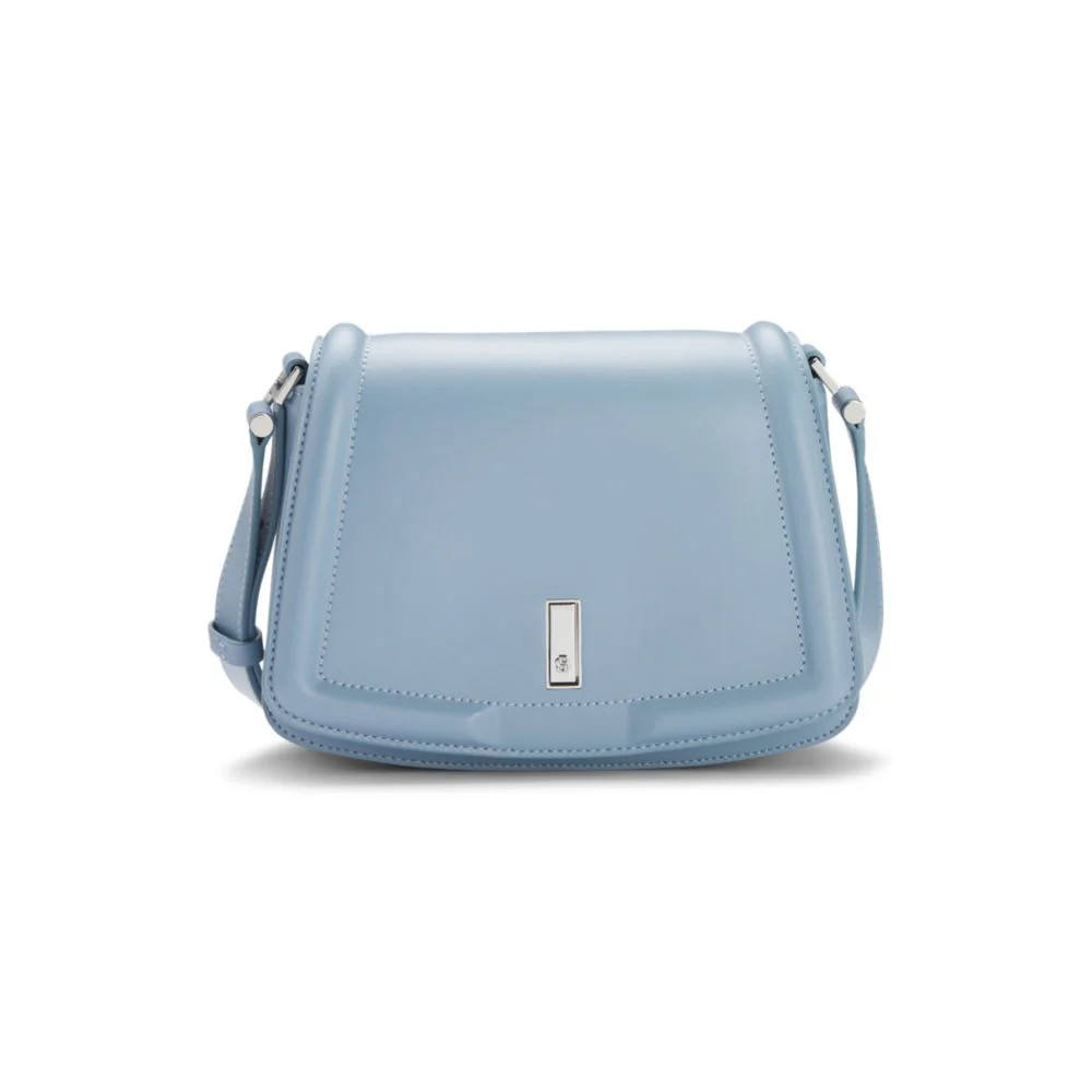 Leather saddle bag with signature hardware and monogram | Shop Simon