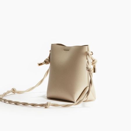 Cream faux leather crossbody bag 

#LTKitbag #LTKstyletip #LTKfindsunder50