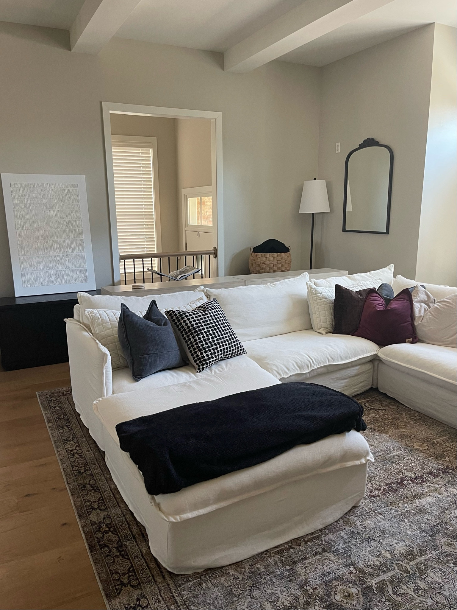 My living room! I’m not able to link this exact sectional on LTK. It’s Sixpenny’s Neva corner sectional in water lily. However I found exact quality from Amazon & wayfair under $2k linked. Reviews were great on both sites! 

Pillows, throw blanket, mirror, floor lamp, wall art, coffee table book, stand, basket, rug, couch, home decor 

#LTKHome #LTKSaleAlert #LTKFindsUnder100