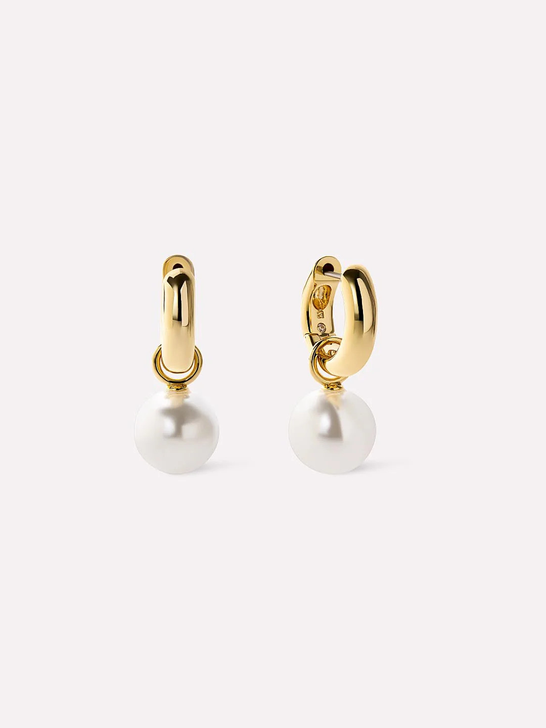 A perfectly chic pairing, these pearl drop earrings plated in 14k gold feature sleek glass pearl ... | Ana Luisa