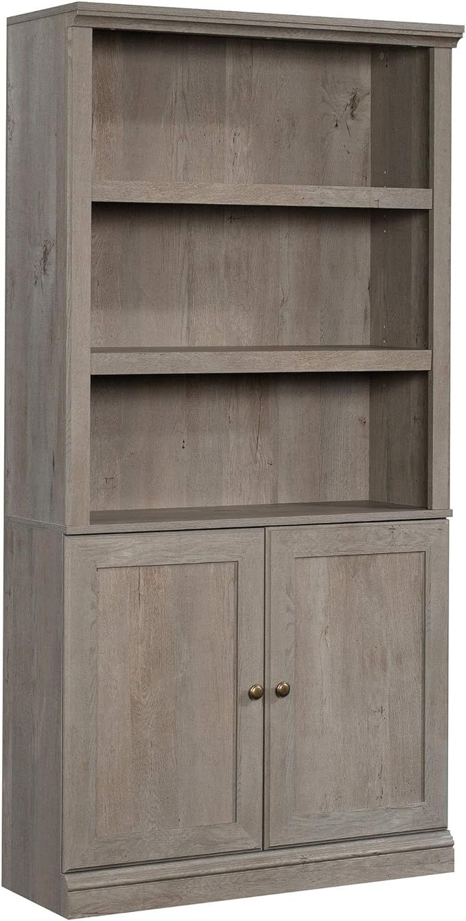 Sauder Miscellaneous Storage Bookcase with Doors, L: 35.28" x W: 13.23" x H: 69.76", Mystic Oak F... | Amazon (US)