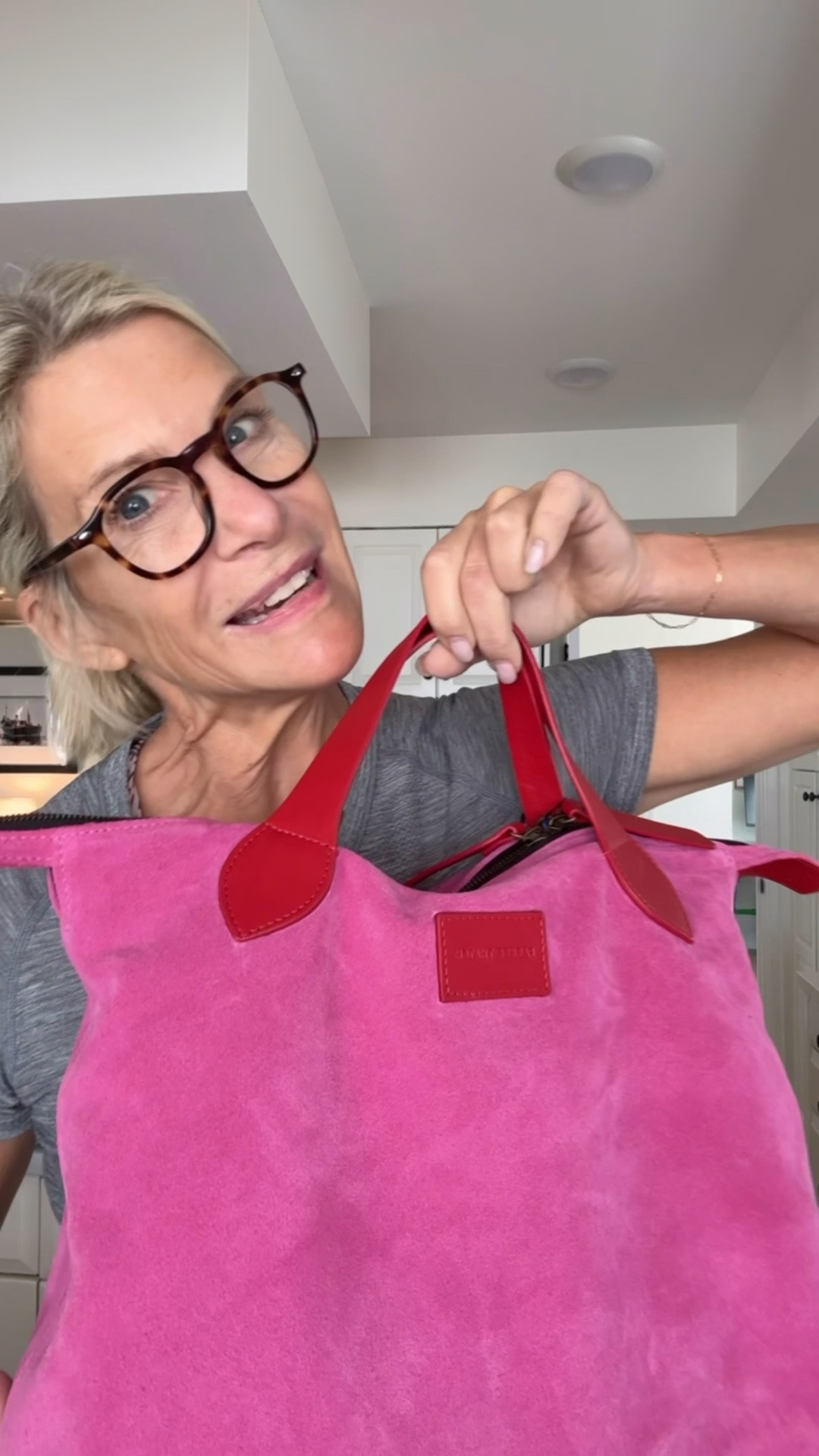 Love pink and red together. For a summer suede bag this is fab 🩷❤️