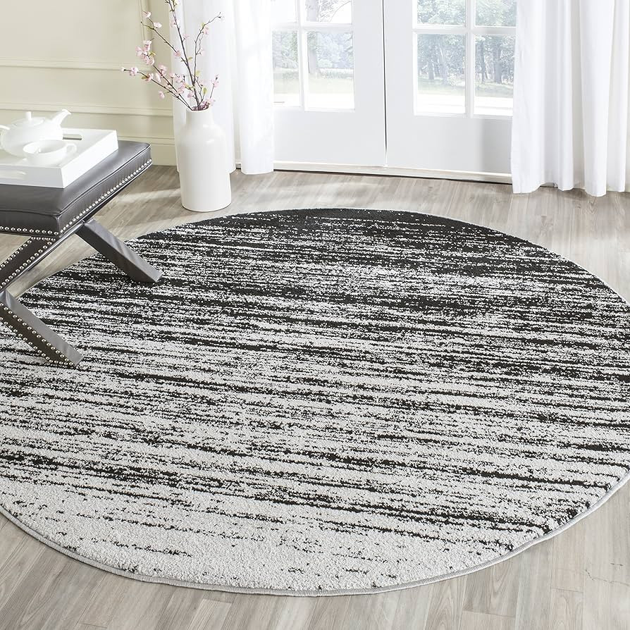 SAFAVIEH Adirondack Collection 6' Round Silver / Black ADR113A Modern Ombre Non-Shedding Dining R... | Amazon (US)