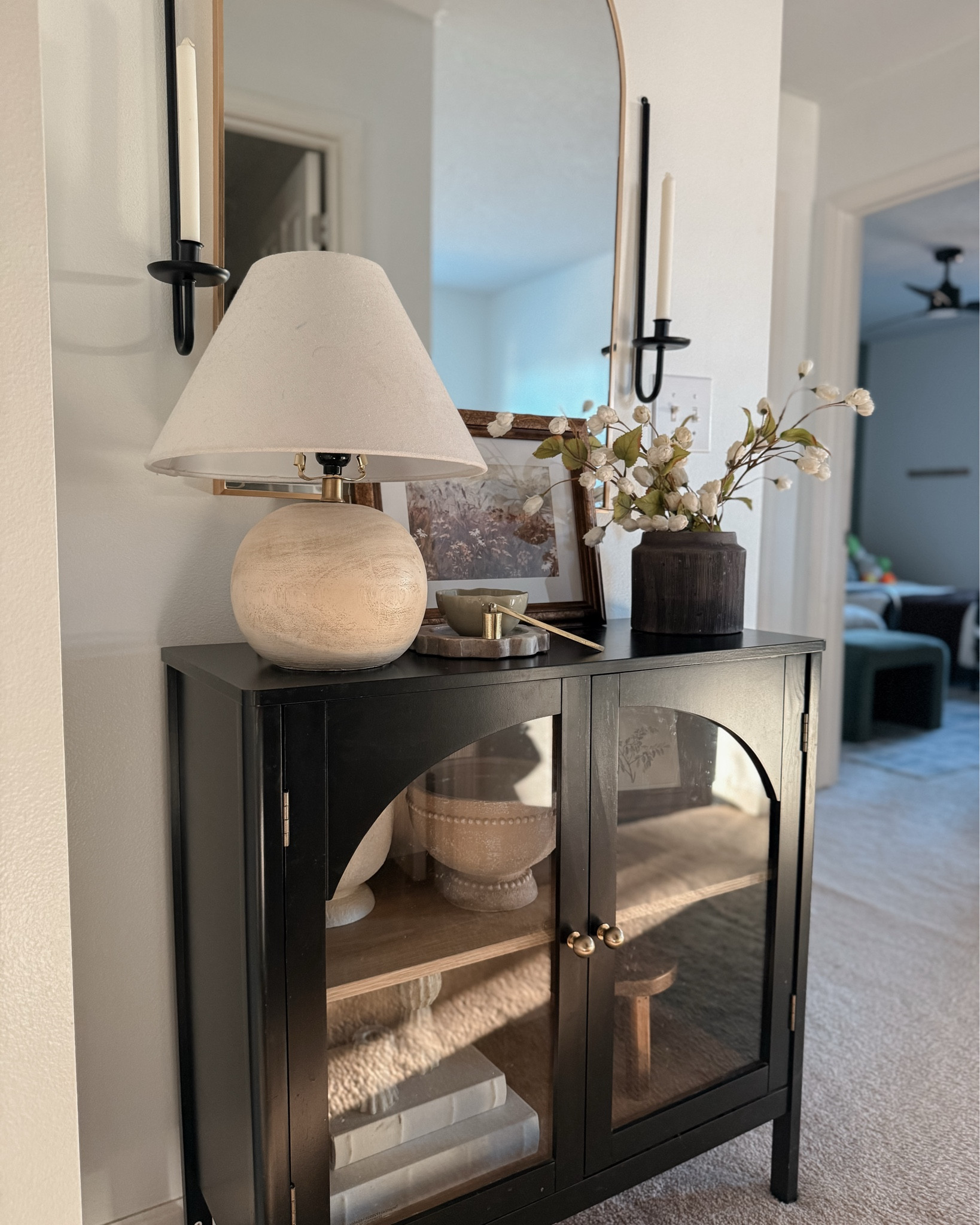 Hallway views 🤍 my Bedford cabinet is currently on sale! Also, my planters that are paired together are on rollback sale right now too! 

#LTKHome #LTKSeasonal #LTKSaleAlert