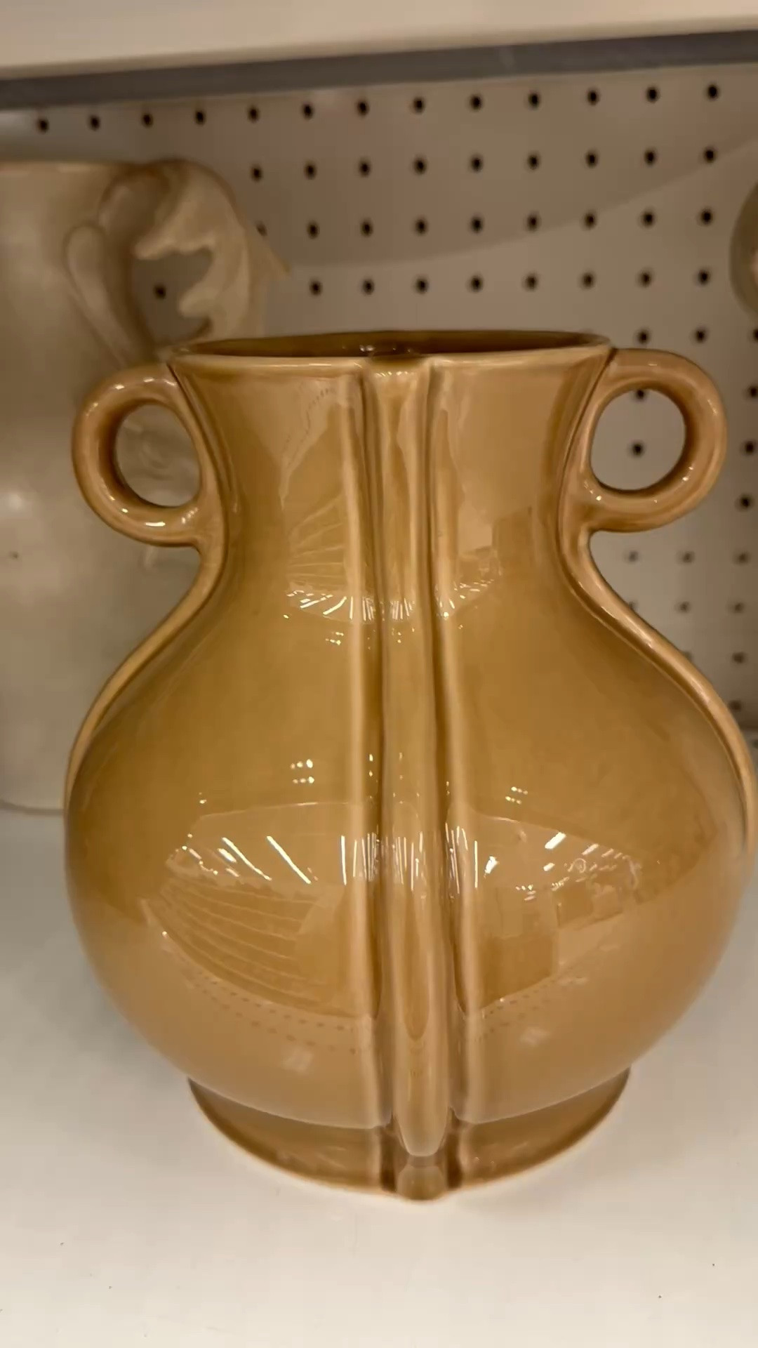 Fall is coming….and I’m excited! 🍂 This ceramic vase features round handles, a center seam, and a gorgeous caramel glaze. There’s also a matching decorative bowl.

And if you’re a mosaic artist, this vase would also be a fun substrate for your tile work. For mosaic tips, tutorials + inspiration please visit my YouTube channel: YouTube.com/julieweilbacher, and follow @julieweilbacher on Instagram.

#decorativevase #tablescape #falldecor #ceramicvase #target #decorativeceramicvase #mosaic #vasewithhandles #brownvase

#LTKHome #LTKSeasonal