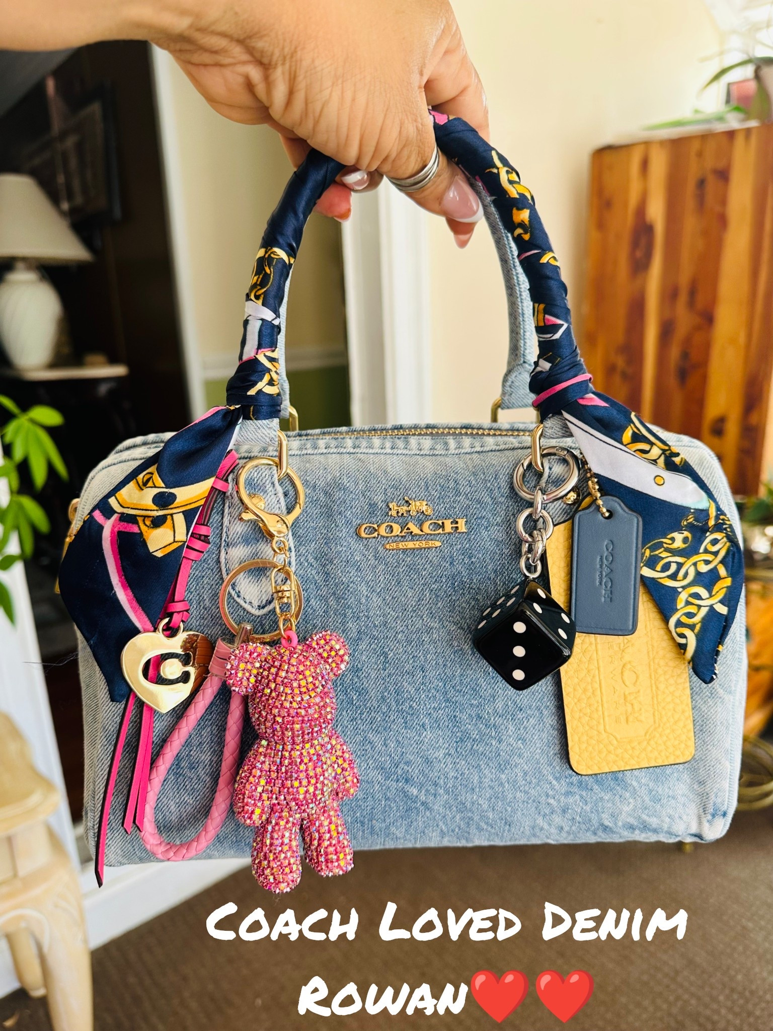 An ABSOLUTELY AMAZING carry! The Coach Loved Denim Rowan! Grab it! 