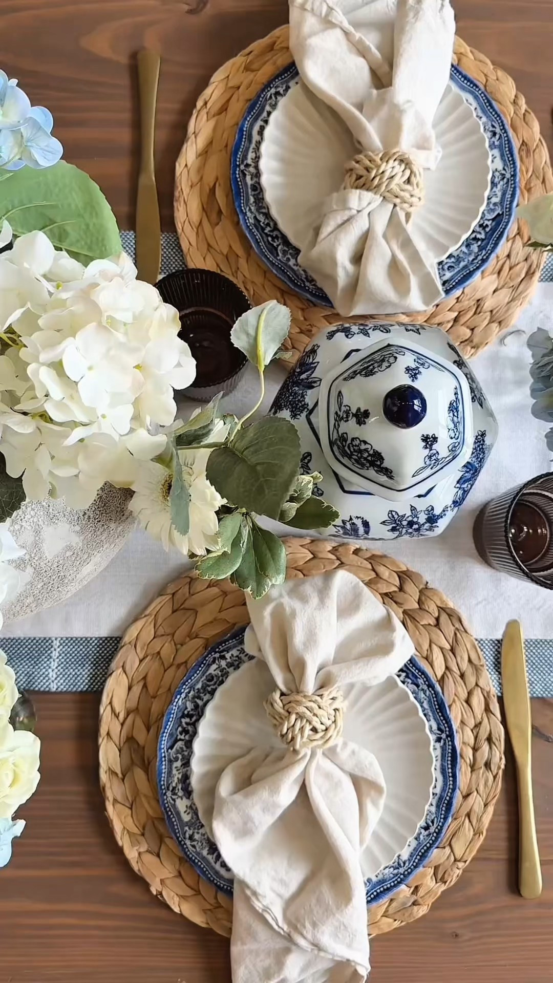 Spring tablescape ideas that allow subtle hints of patterns, pops of color, and not to mention SCREAMS wealth and prosperity without breaking the bank.

Tip:  An easy way to add pattern without overdoing it: layer a solid plate over a patterned one — subtle, quiet, but it still stands out.

•
•
Spring dining room table setting, chinoiserie, blue and white French toile , Amazon home kitchen styling decor, ginger jars, faux hydrangeas, centerpiece ideas, home decor finds, seasonal decor, tablescapes, wicker placemats, gold cutlery utensils , spring wedding 

#LTKHome #LTKSeasonal #LTKWedding