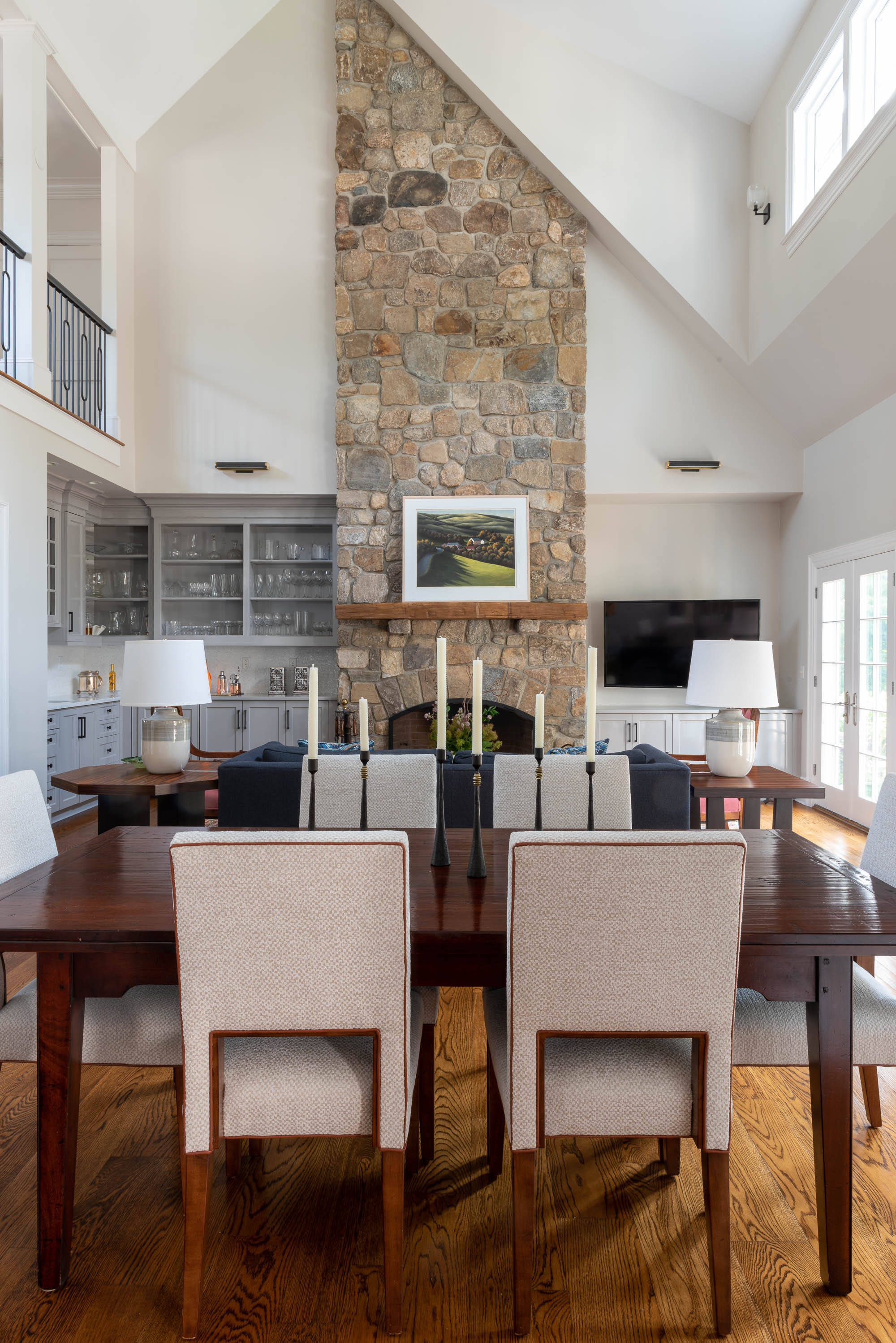 This open-concept dining room slash living room just feels like fall 🤎 Brown and cream hues, cozy dining room chairs, handcrafted candlesticks, and earthen lamps make this the perfect space for enjoying autumn. Check out our fall decor finds inspired by this space! 

 #LTKHalloween #LTKSeasonal #LTKHome