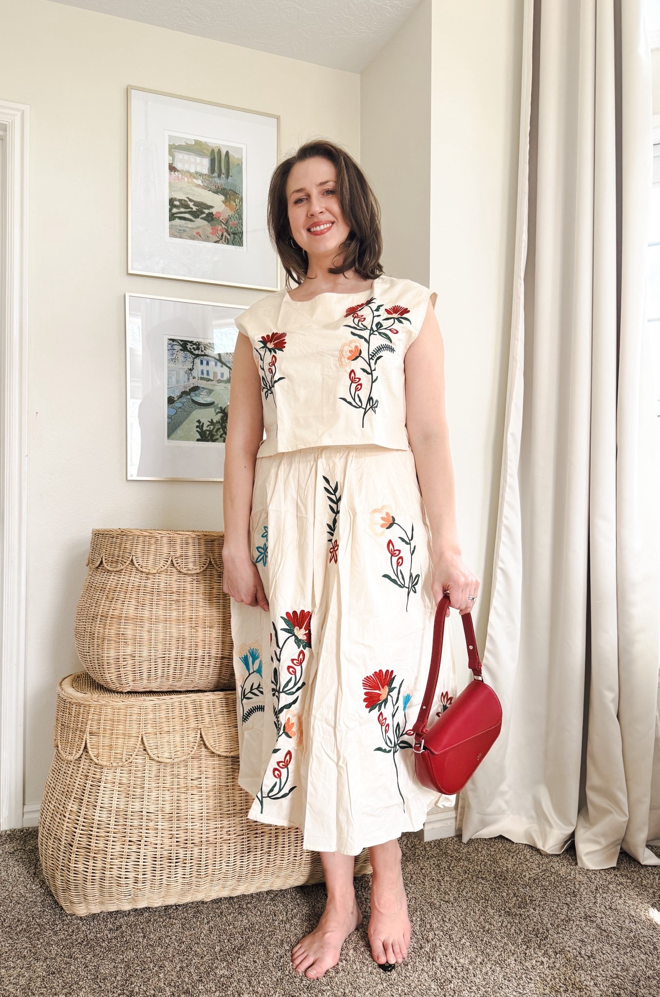 A pretty two piece skirt set for spring and summer. This pretty embroidered midi skirt comes with a matching top at an affordable price! I’ve paired it with a small red purse and raffia sandals. 

I’m 5’9” and wearing a size large which is a perfect fit.

#date night outfits #spring outfits 2026 #spring dresses #vacation outfits beach #ltkshoecrush #ltktravel 

@ltk 

#LTKTall #LTKOver40 #LTKootd