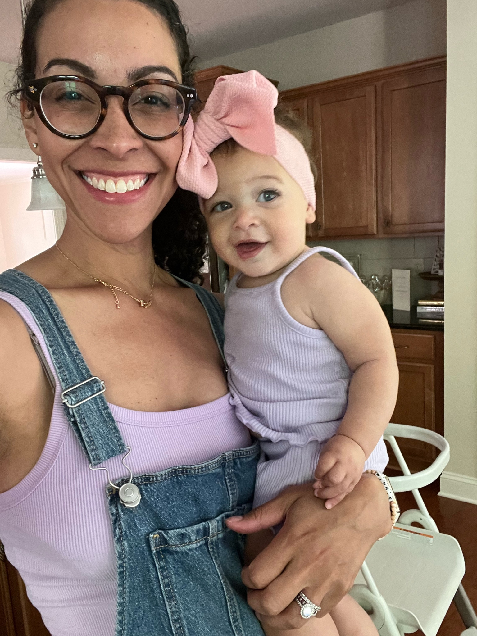 Matching girlies! 💜🎀 let’s hear it for nursing friendly tank tops under $3! 👏🏾 