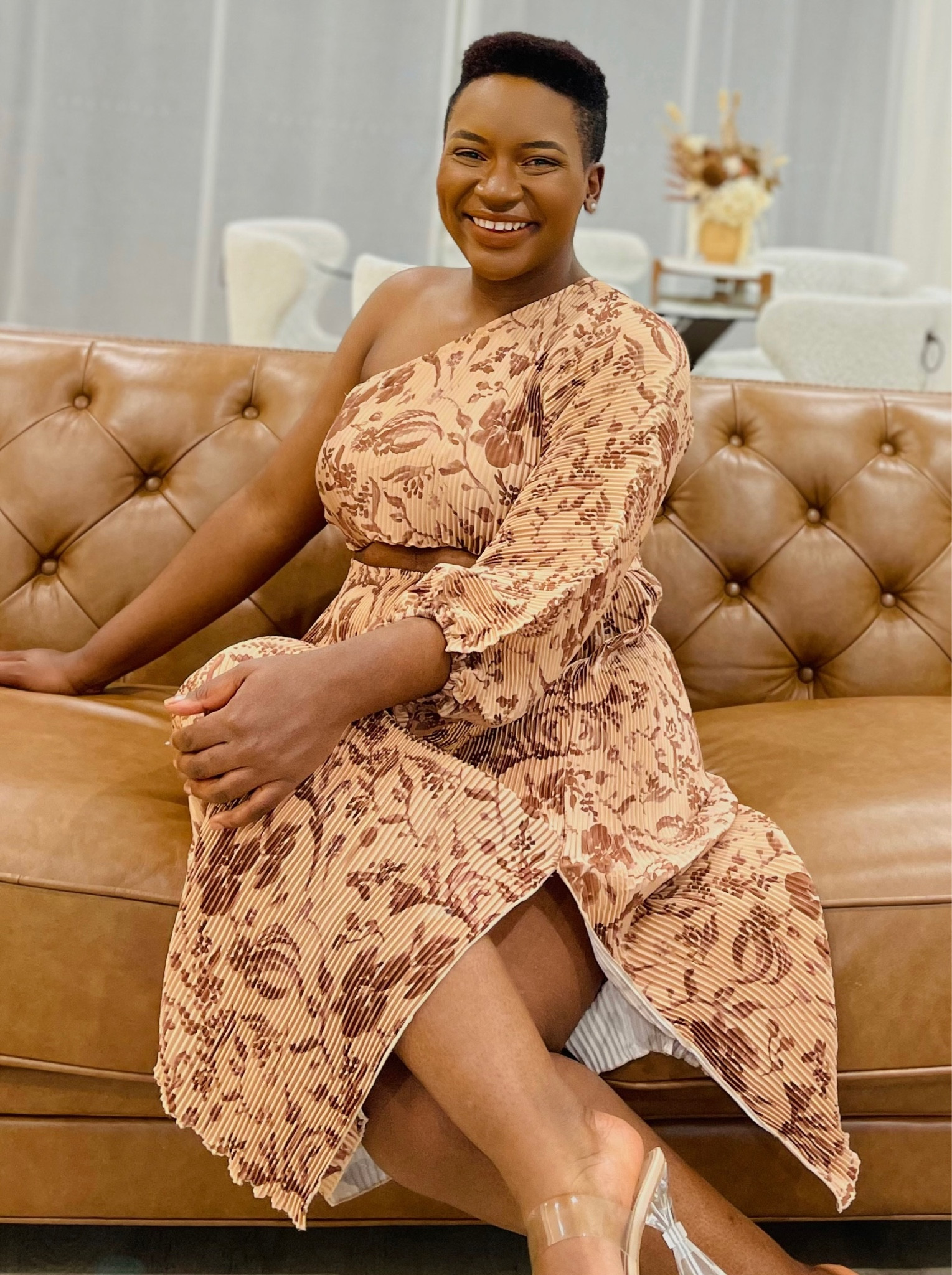 Such a fun dress that has great stretch and side cut out feature as well as side split detail. The fabric is pleated and looks great even without being ironed. 

#LTKwedding #LTKSeasonal #LTKstyletip