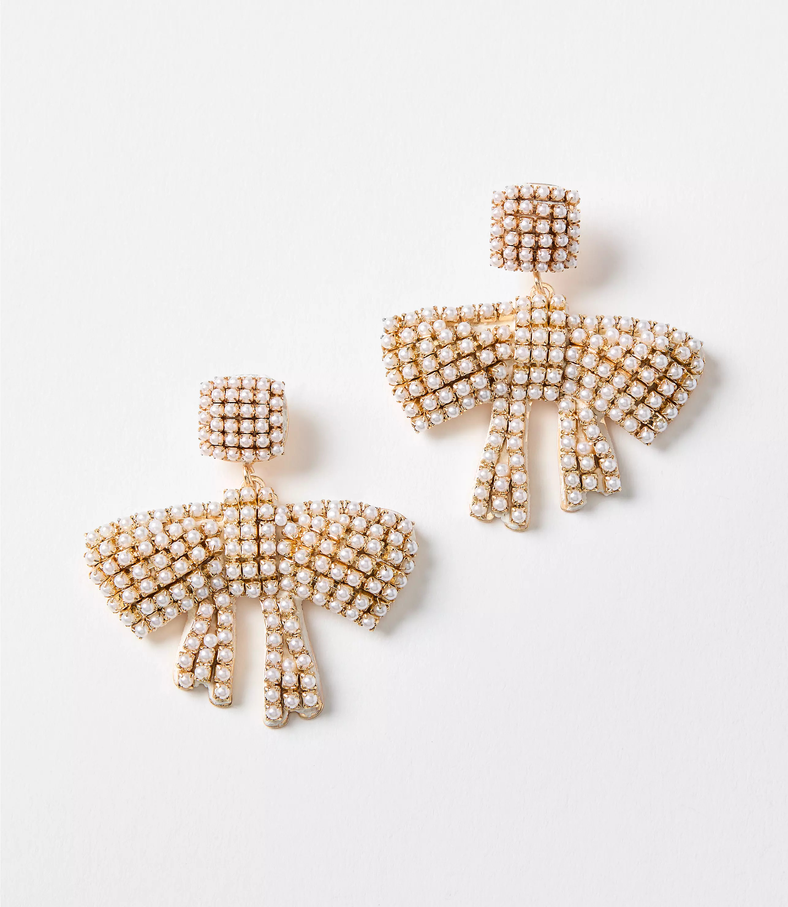 Pearlized Bow Statement Earrings | LOFT