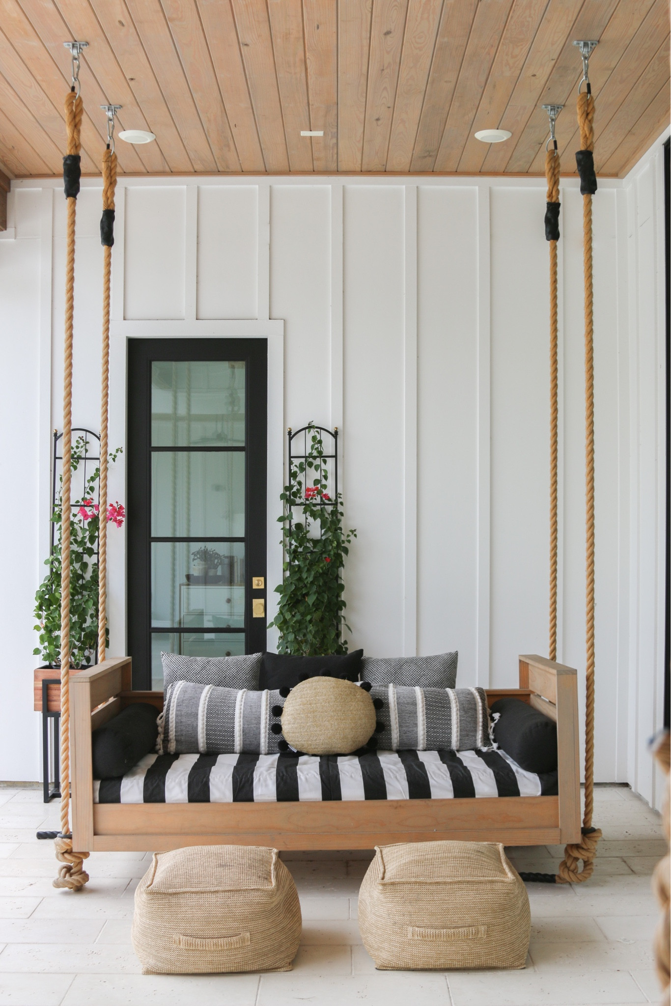 Porch swing, Outdoor Furniture, patio furniture, outdoor daybed, sunbrella, planters, trellis, exterior lights 

#LTKSeasonal #LTKhome #LTKstyletip