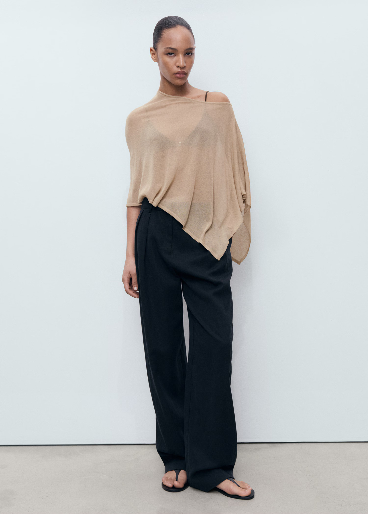 Asymmetrical knitted cape | MANGO (UK)