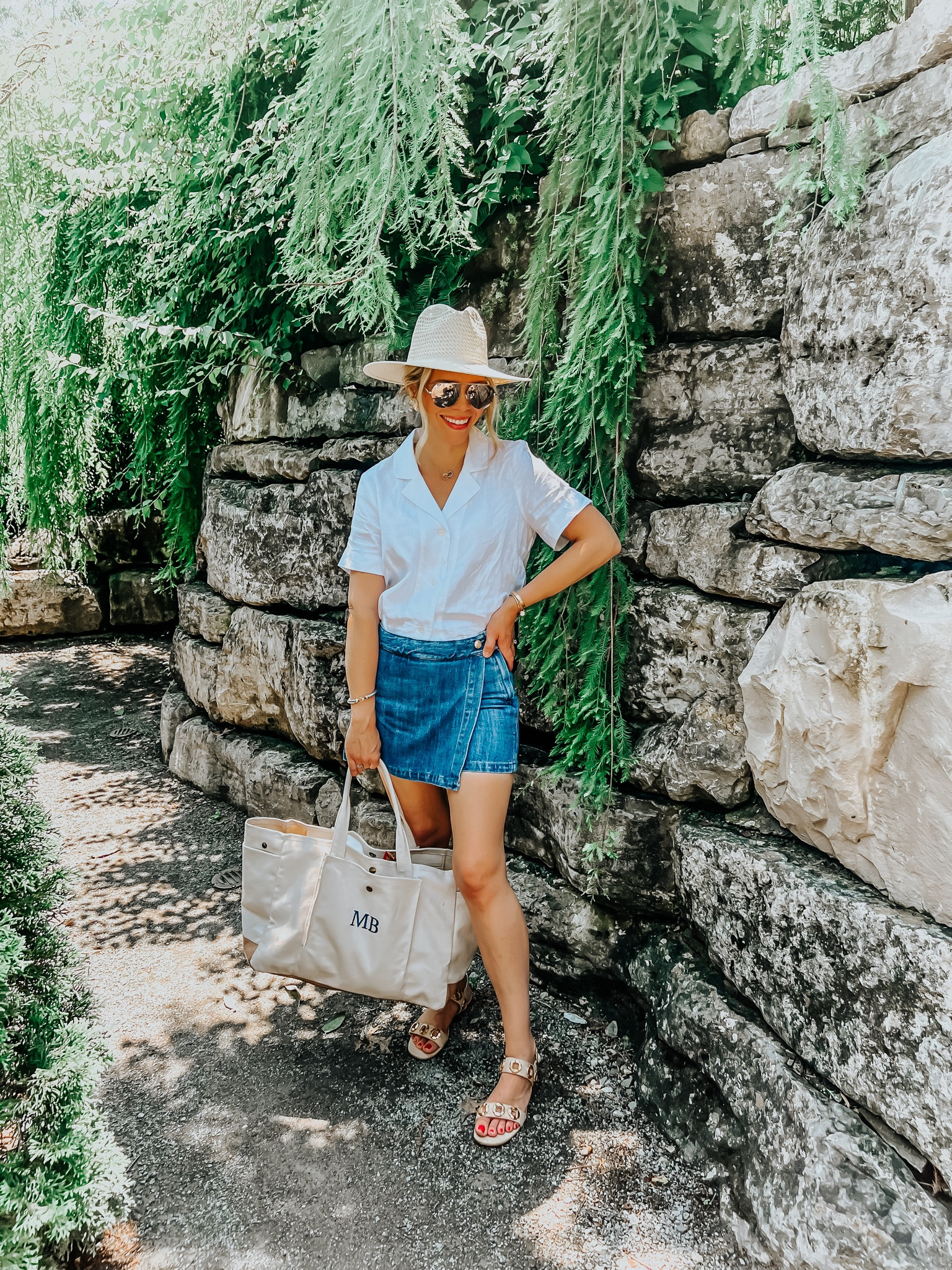 OOTD linen shirt, denim skort, white linen shirt, packable hat, hat, fedora hat, monogram tote, tote, canvas tote, beach bag, sunglasses, aviator sunglasses, sandals, raffia sandals, gold earrings, crescent earrings #LTKitbag

#LTKFindsUnder50 #LTKFindsUnder100 #LTKSeasonal