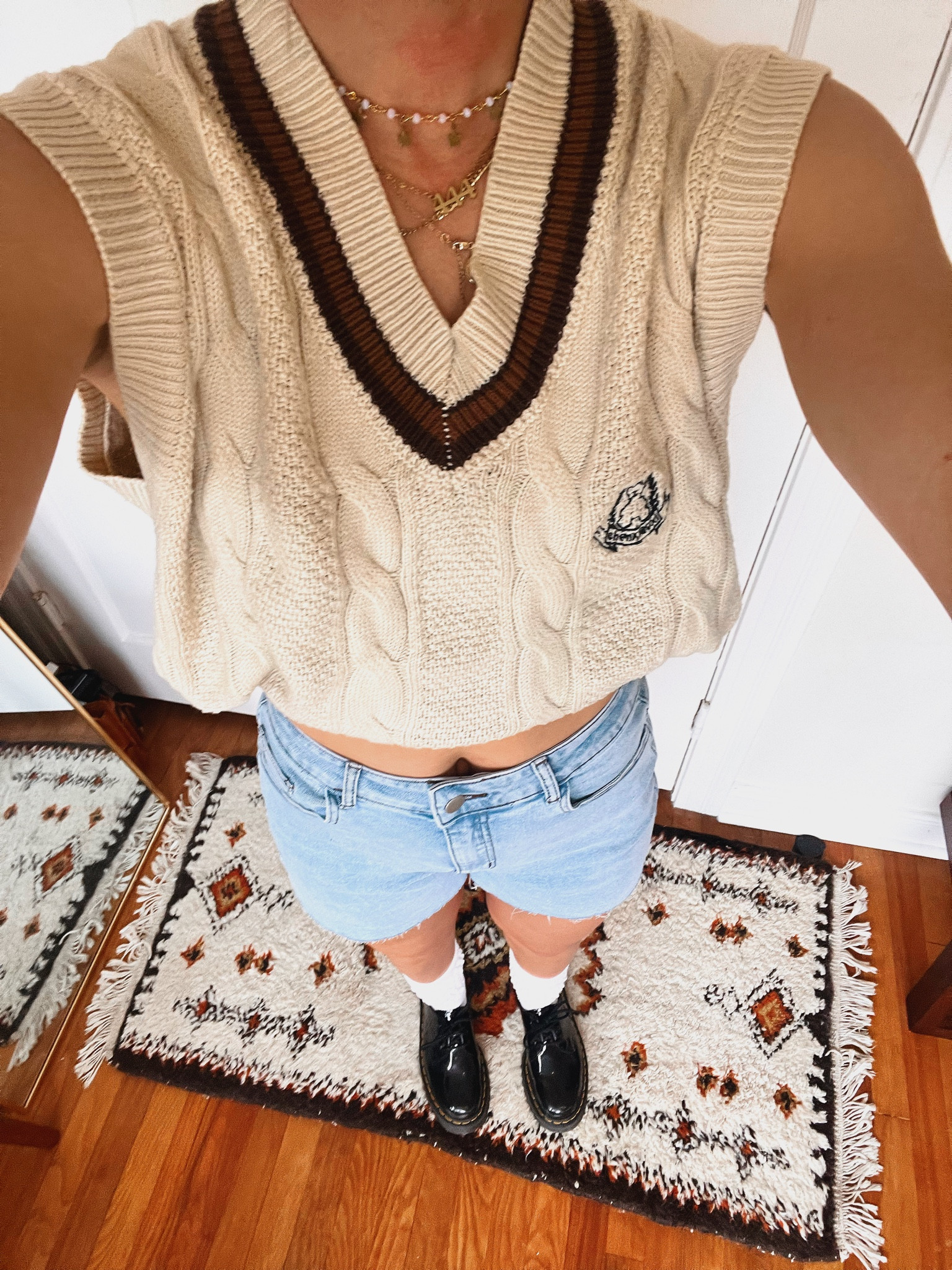 workday fit 🤓
sweater vest that i tucked up in my bra for a cropped look paired with some denim cut offs and platform ankle docs! i scrunched my socks down to give the illusion of smaller ankles then i have haha it’s a good edit - always smart to dress for your body!

#LTKstyletip #LTKshoecrush #LTKworkwear