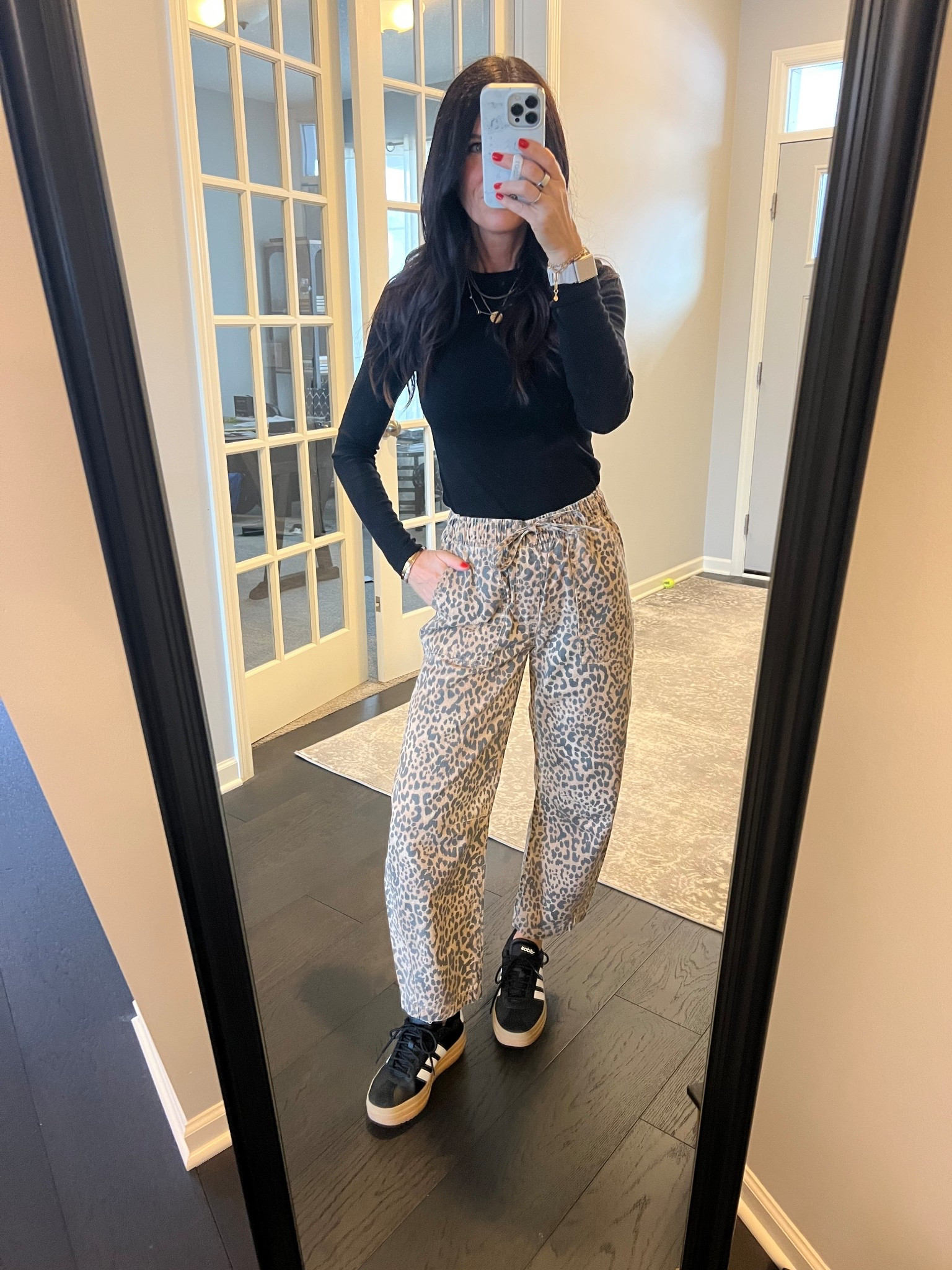 These leopard print barrel jeans are so fun! Comfortable, easy to wear and instantly add some interest to your outfit. I’m wearing XS, they’re a bit oversized but the drawstring waist makes them easy to adjust. I keep wearing these long sleeve ribbed tees too - this is an XS as well. These pieces are all so versatile! 🖤🤍🤎

#LTKOver40 #LTKootd #LTKSaleAlert