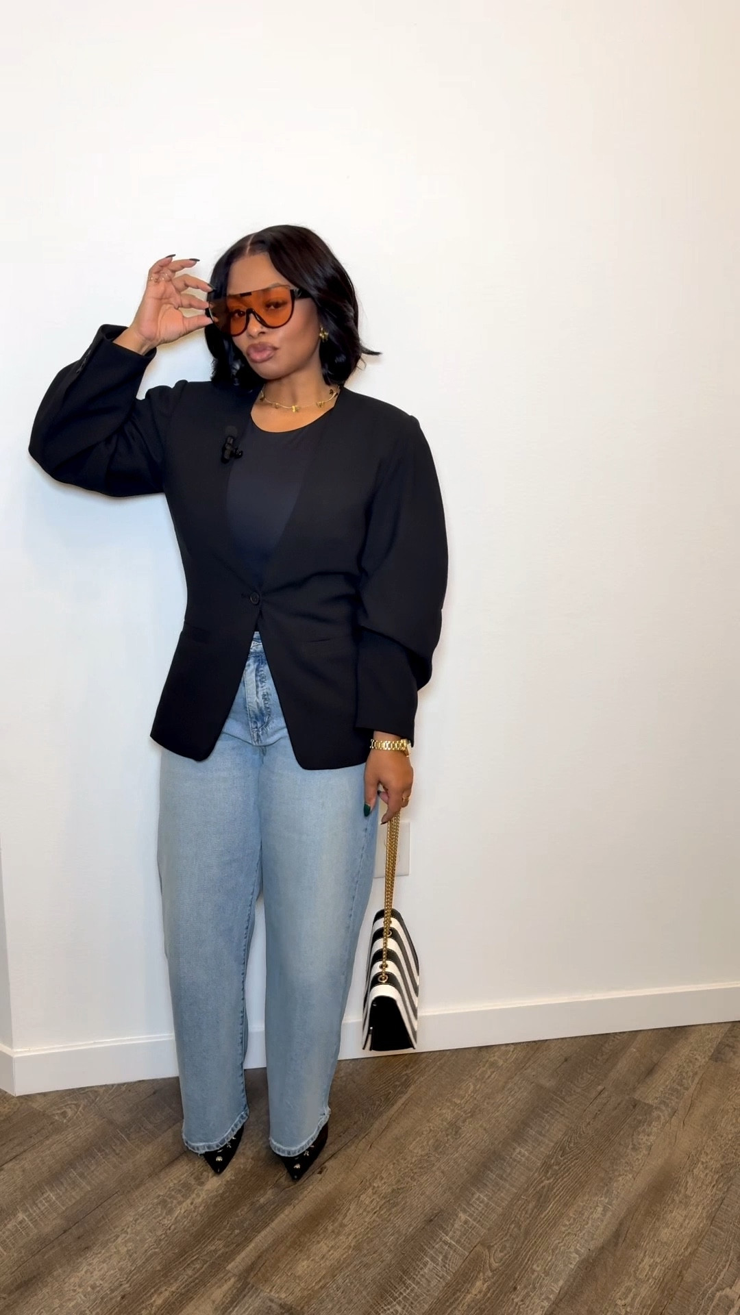 Corporate girlies, short girlies, THICK + CURVY girlies — this Monday look was made for us. 🖤🤎

And yes… you’re gonna want this NOW.

I’m 5’2, 158 lbs wearing a size M (8/10) blazer + size 4 wide-leg jeans with amazing stretch. I sized up intentionally for that oversized, boss-energy vibe — and it still works perfectly for petite frames.

Why this blazer is THAT girl:
✨ Barrel sleeves = arm space + zero arm insecurity
✨ Button sits above the belly button = instant cinched waist illusion
✨ Falls perfectly over the stomach (my thick & curvy girls, I see you)
✨ Creates an hourglass effect without trying

The wide-leg jeans balance the shoulders, elongate the legs, and bring the whole look together. Paired with Karl Lagerfeld pointy-toe kitten heels and a sleek bob so the blazer stays the main character.

This is one of those closet staple blazers you’ll wear a million ways — work, brunch, meetings, coffee runs, EVERYTHING.

Trust me… you need this look in your closet. 💼✨

#LTKValentine #LTKootd #LTKgrwm