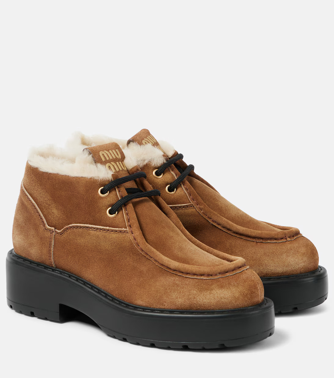 Chunky shearling-trimmed leather flats | Mytheresa (US/CA)