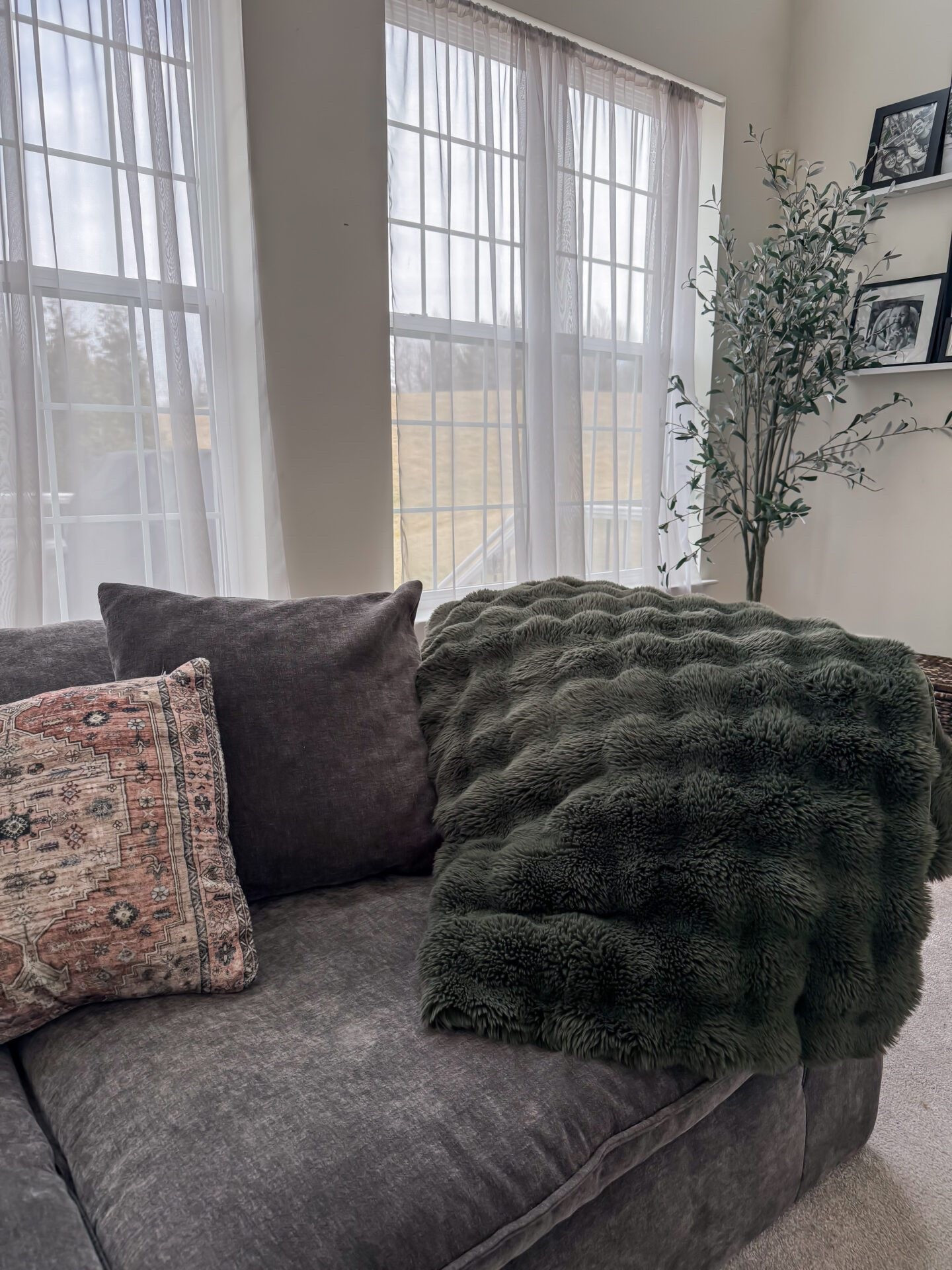 Meet the Amazon blanket that my entire family (including the dog) fights over – ha! (And that’s saying something since we have approximately too many blankets in our family room…including Barefoot Dreams). I haven’t touched the $350+ Lola blankets, but I’d imagine this feels pretty dang similar. It’s such a luxe, heavier-feeling plush – totally dreamy for cozying up on the couch.

#LTKHome