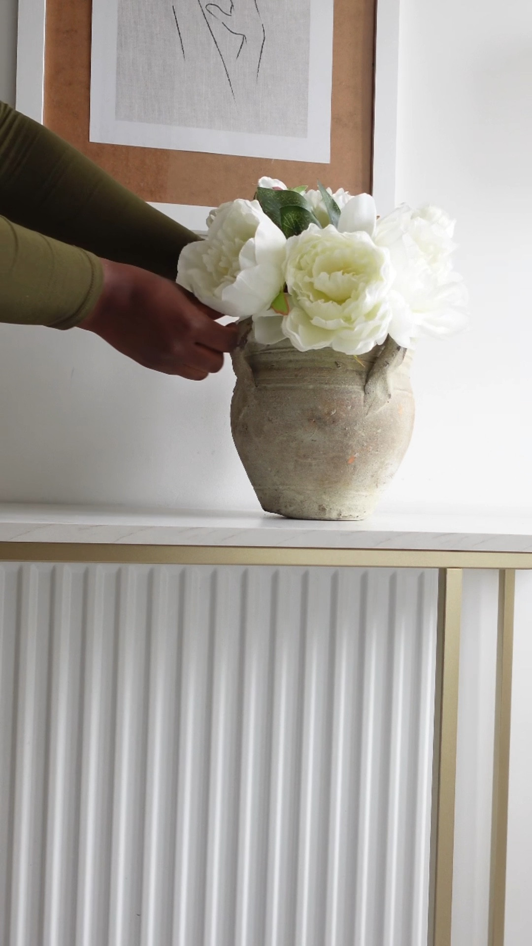Simple console styling with a textured vase

#LTKunder50 #LTKhome #LTKFind