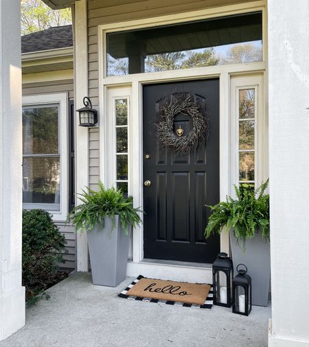 Here are some affordable front porch decor ideas I have at my own home.  

Walmart planters.  Gray planters.  Front door mat.  Walmart black lantern.  Outdoor decor.  Front porch decor.  

#LTKHome #LTKSeasonal #LTKFindsUnder100