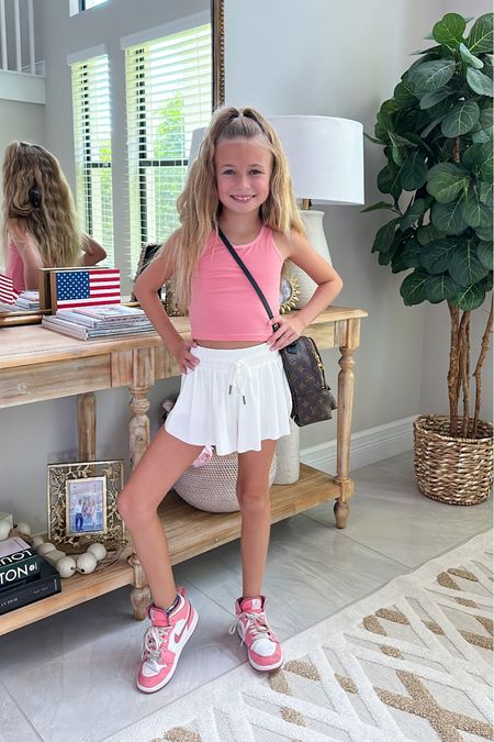 The cutest cropped tanks and shorts for summer. Andi is in the 5-6 tank and xxxs shorts. 