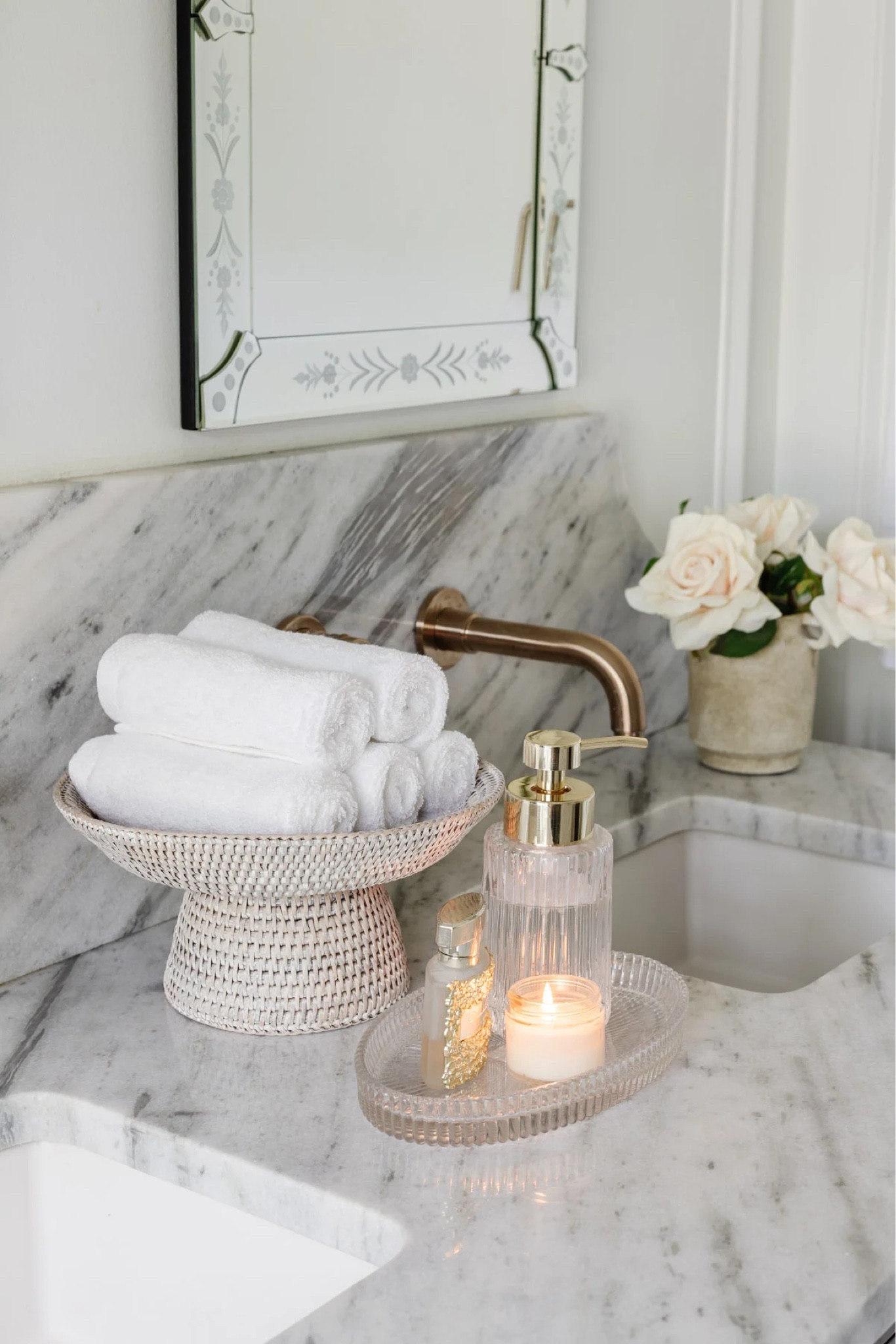 Bathroom vanity organization that makes you want to keep the space clean 😍

Soap dispenser, vanity tray, ribbed glass and gold soap dispenser, towel holder, wayfair, target 

#LTKHome