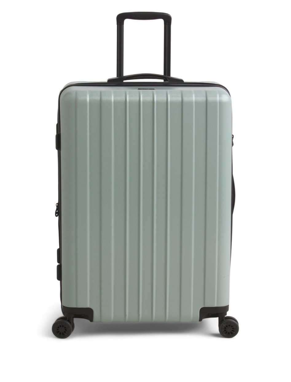 Calpak hard shell spinner! 

#LTKsalealert #LTKfindsunder100 #LTKtravel