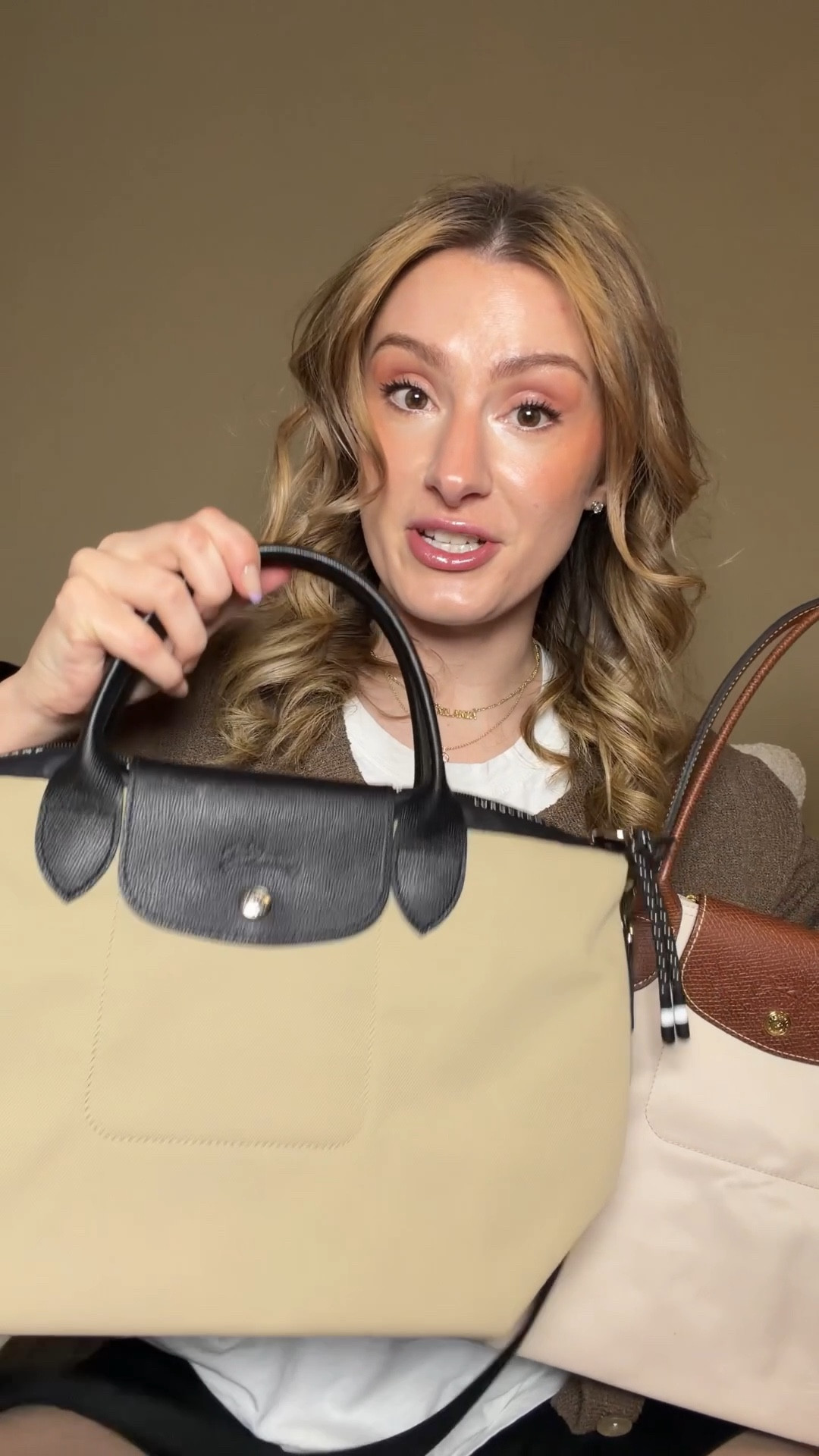 Let’s compare the Longchamp Le Pliage Energy with the Original Le Pliage 👜

They are the same shape but that’s about where the similarities end! The original is made out of nylon while the energy is made out of a different type of nylon which has a completely different feel and is made out of different recycled materials

The leather trimmings on the energy Pliage are black while the original trimming are brown.

The energy hardware is silver while the original is gold.

And the energy comes with holes punched for a crossbody strap



#LTKNYFW #LTKdayinmylife #LTKootd