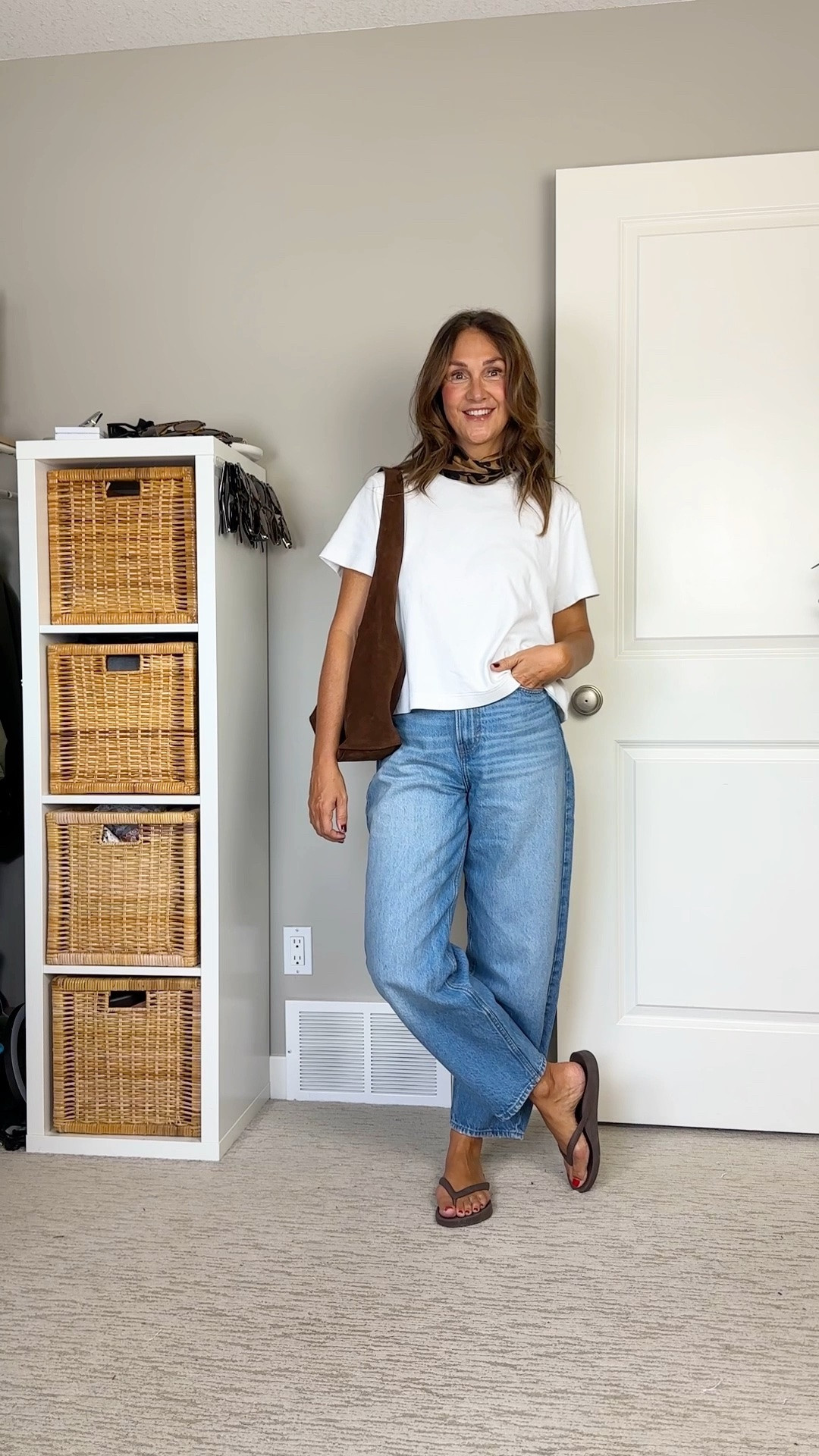 September outfit! It was a fairly warm day so I added a silk scarf and suede bag to give the outfit a fall touch 🤎 My barrel jeans are old from H&M but it looks like the same style is back. If they fit the same get your usual size. My boxy tee is also old but still available on the U.S. Old Navy website. Flip flops have arch support and are super comfortable, fit tts.

#LTKcanada #LTKfall #LTKover50style