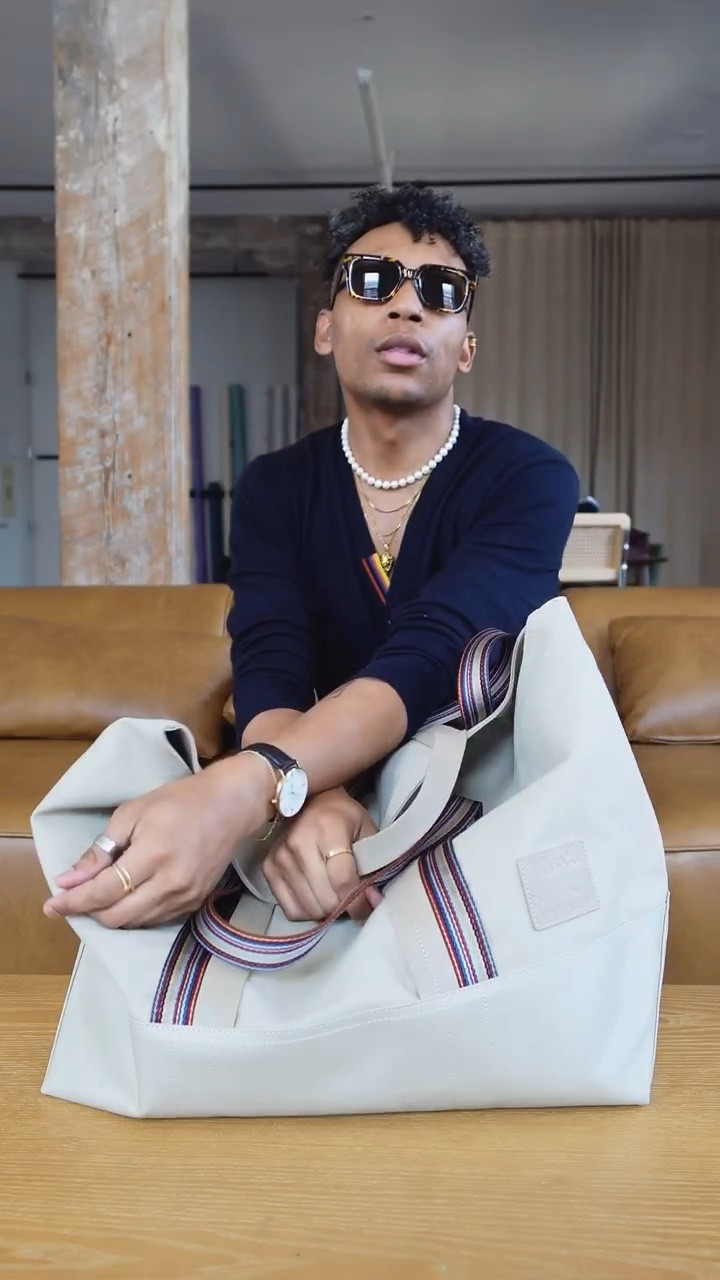 hi @britishvogue! my @paulsmithdesign signature stripe canvas tote is full of secrets no more 😉👀 #gifted #paulsmith #whatsinmybag