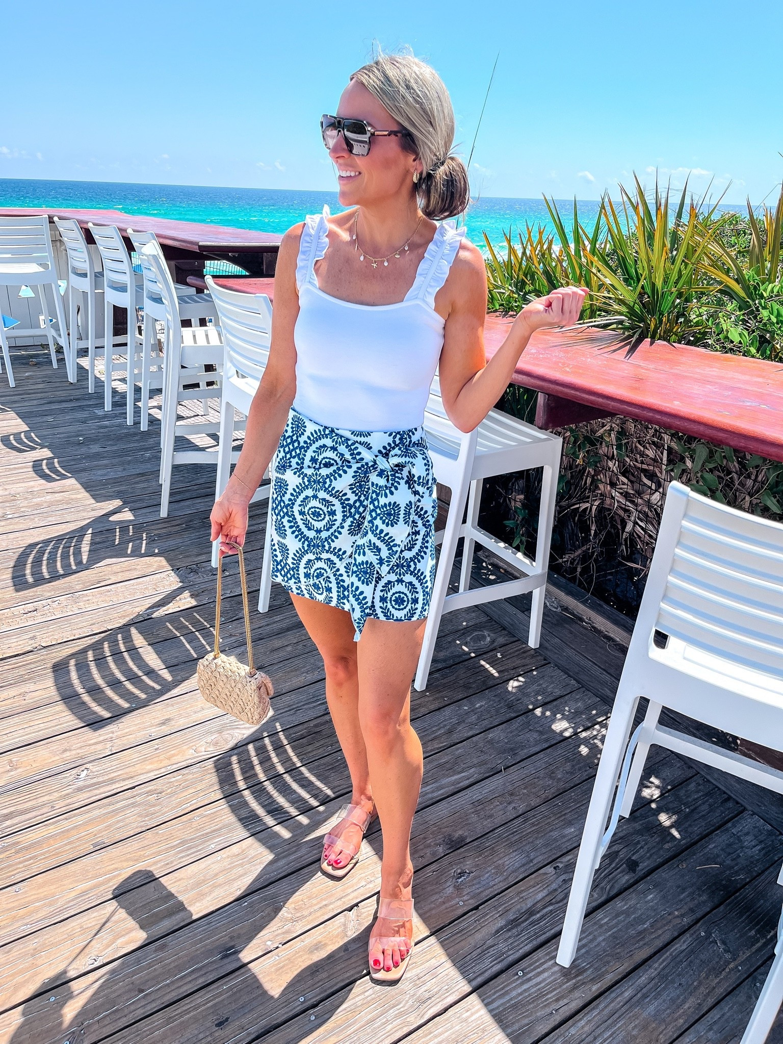 Faux wrap style skirt, zippers in the back. Ruffle sleeve tank. Wearing xs. My favorite sandals this season! Go with everything! Can be dressed up or down. TTS.

#LTKSeasonal #LTKTravel #LTKootd