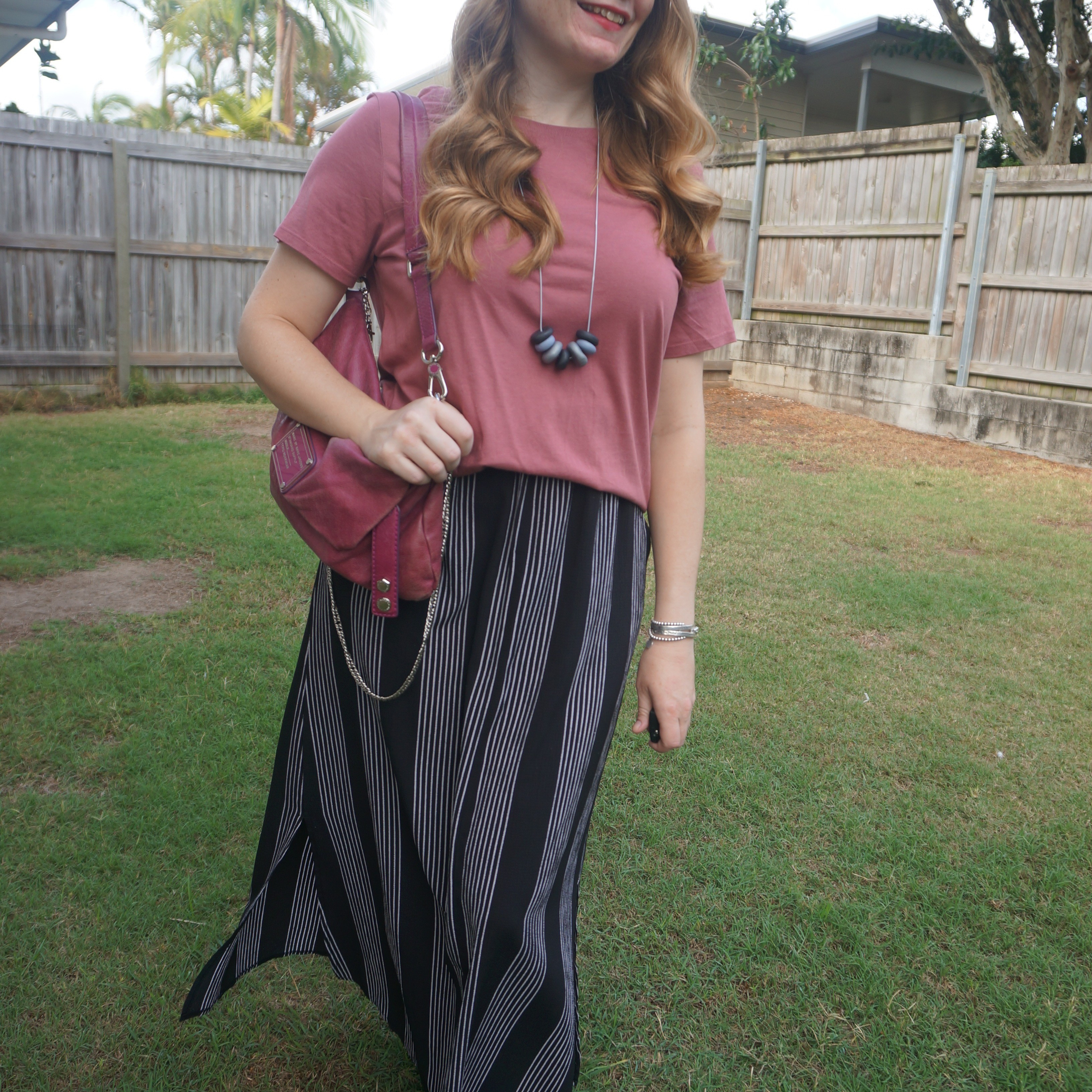 Pink tee, vertical striped maxi skirt and thrifted vintage Marc By Marc Jacobs convertible clutch bag 💕

#LTKbag #LTKaustralia #LTKspring