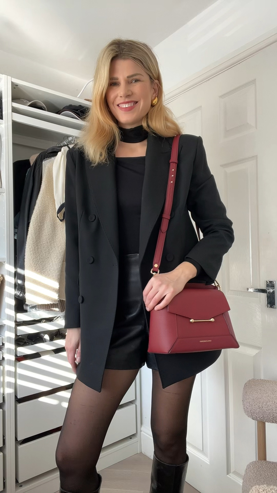 Burgundy bag, Strathberry bag, black blazer, leather shorts, black boots, knee high boots 

#LTKuk #LTKautumn #LTKeurope