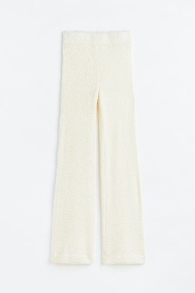 Flared fluffy gebreide broek | H&M (DE, AT, CH, NL, FI)