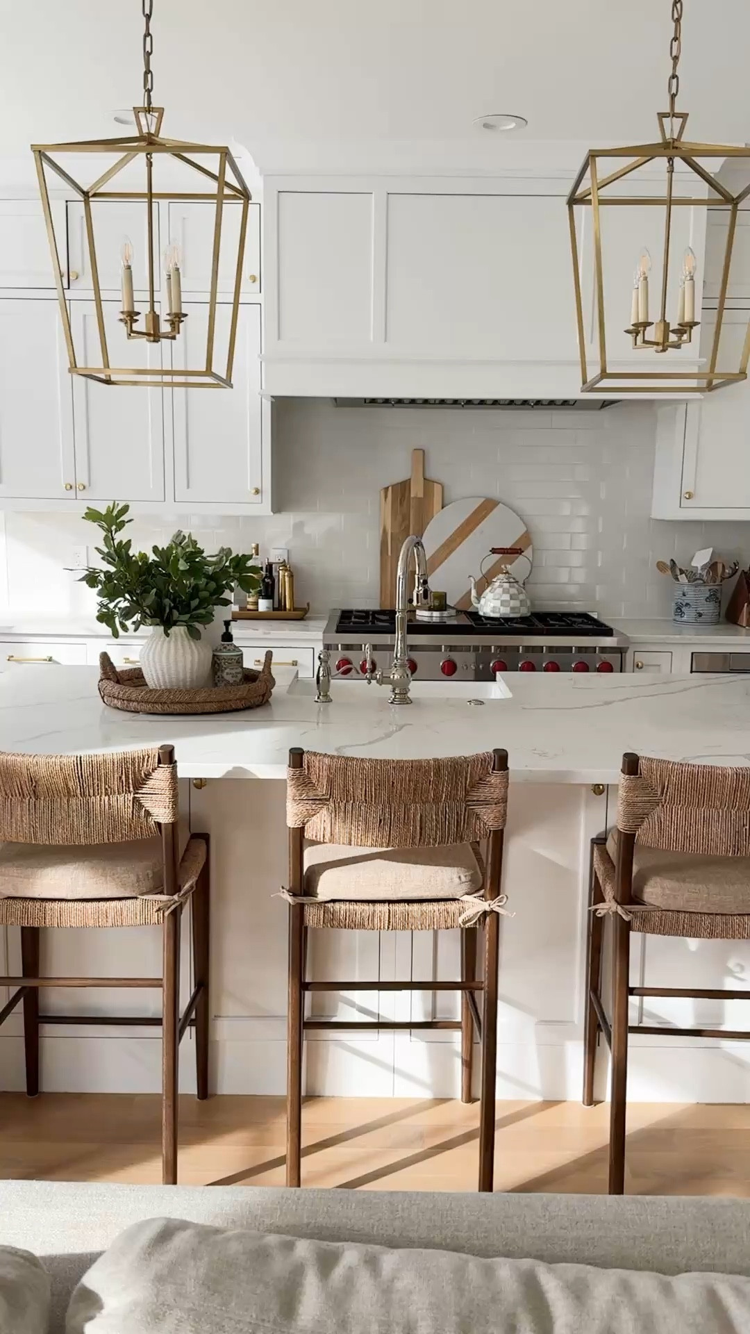 All white kitchen with warm accents and woven counter stools. Modern coastal kitchen design.

#LTKStyleTip #LTKHome #LTKSaleAlert