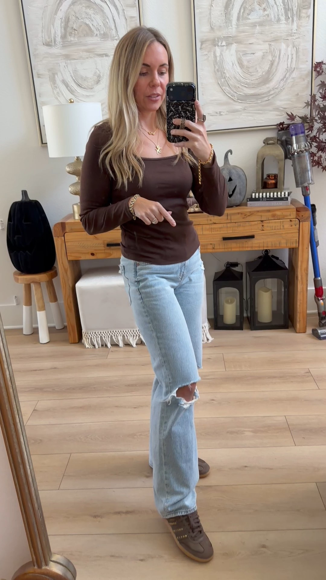 I size down a full size in Adidas(I’m an 8-8.5 and do the 7.5). These are my favorite jeans and they are TTS but they run short. These are a 4 long and they touch the floor. I’m 5’7. Long sleeve top is TTS and this is a small. 

#LTKShoeCrush #LTKStyleTip