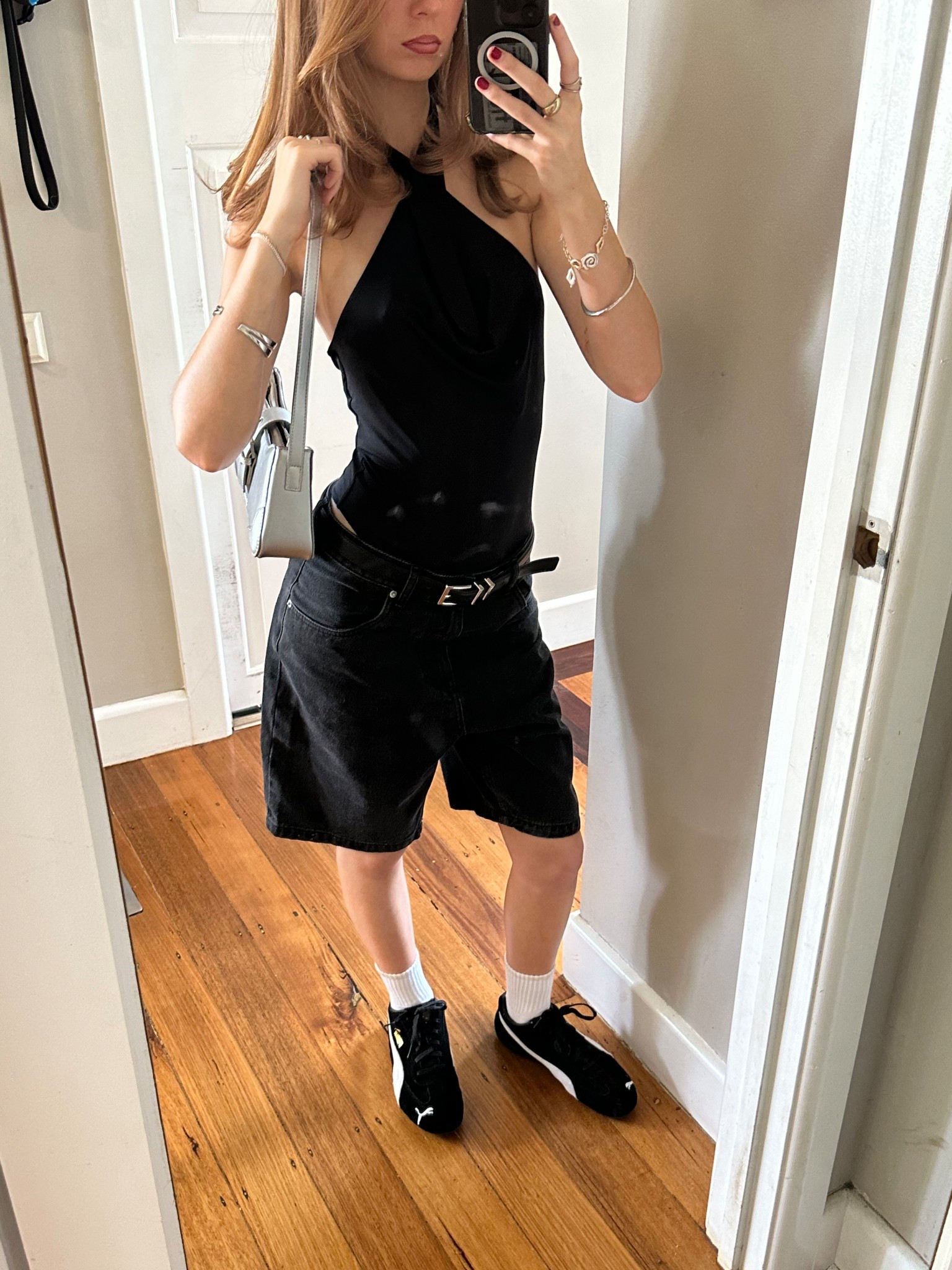 Street style, jort styling tips, black baggy jorts outfits, cowl neck bodysuit, puma speedcats, all blqck outfit, black sneakers, Pinterest fashion, aesthetic outfits, Pinterest girl, women’s outfit ideas

#LTKshoes #LTKstyletip #LTKaustralia