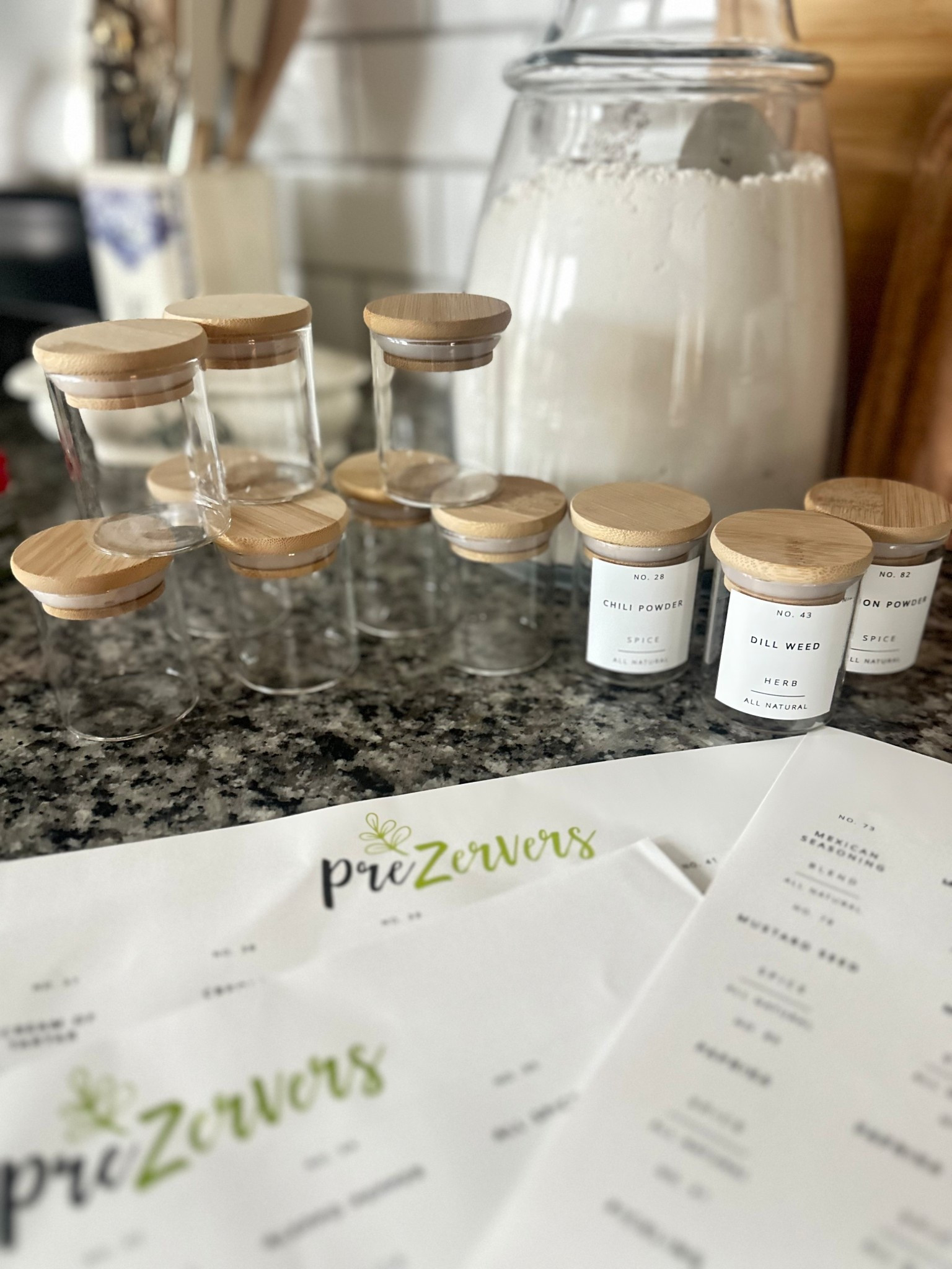 I love using these glass spice jars with bamboo lids for my spice cabinet.

These came with labels that were black with white lettering but I decided to use white labels so I ordered a package that had so many spice names and also a few blank ones you can add yourself.

I put them on a 2-tiered bamboo lazy Susan and I love how neat and organized my pantry looks with these jars! 


pantry organization • spice cabinet • spice jars • kitchen organization • chef 



#LTKHome