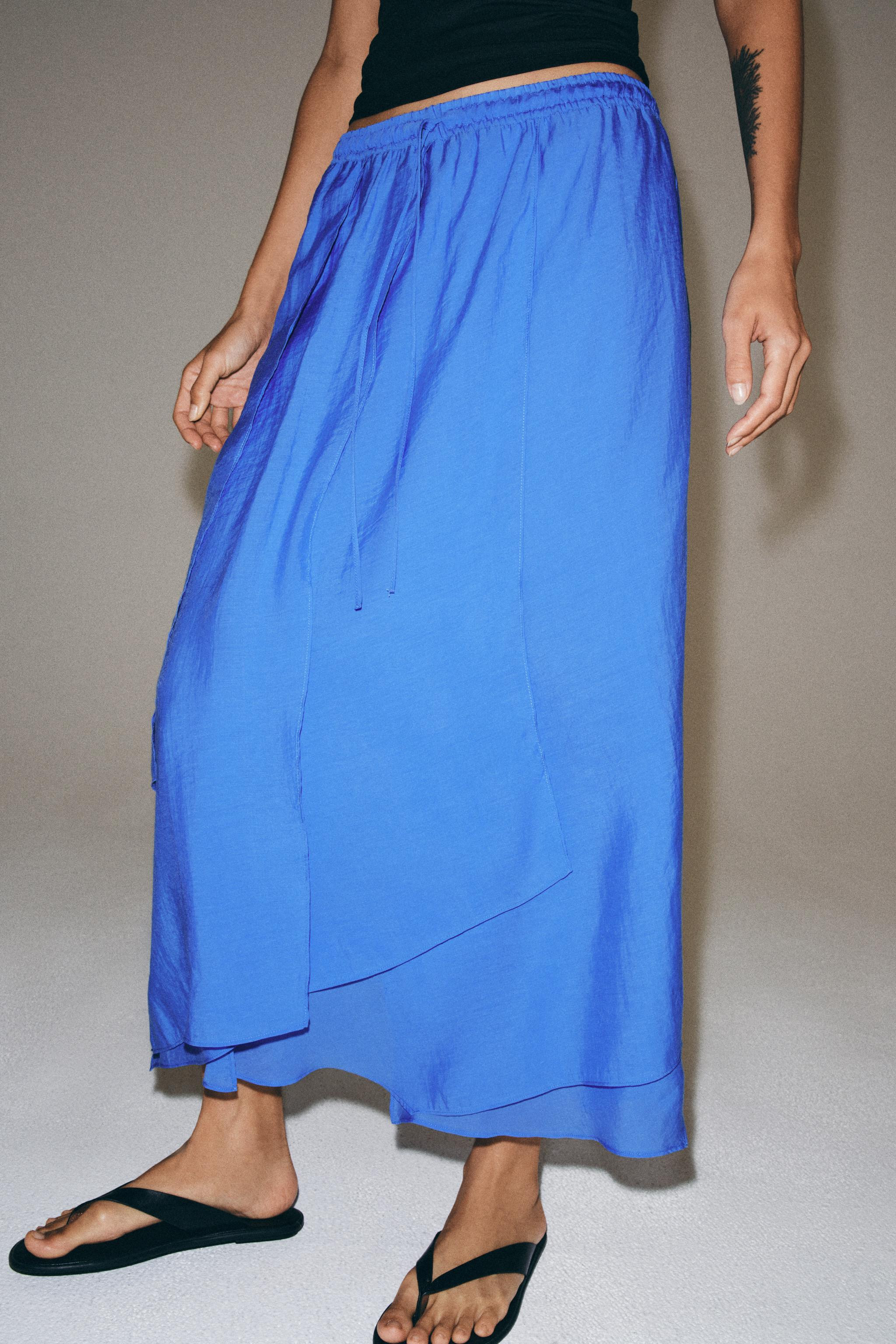 Model height: 178 cmZARA WOMAN COLLECTIONSkirt made from a lyocell blend yarn. Mid-waist with an ... | Zara UK