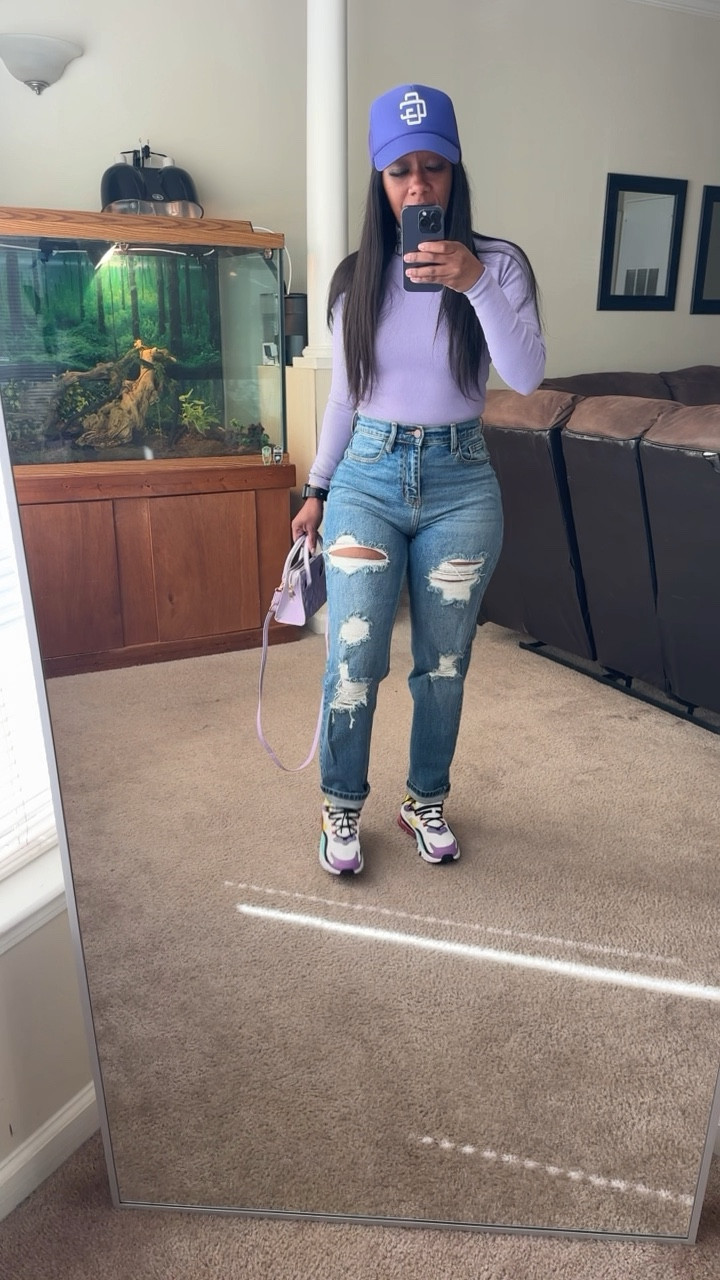 Outfit of the day. I’m wearing a size small purple long sleeve bodysuit, with high waisted distressed jeans in a size 5. To add some color I added a purple trucker hat and a purple crossbody bag.

#LTKshoecrush #LTKfindsunder100 #LTKstyletip