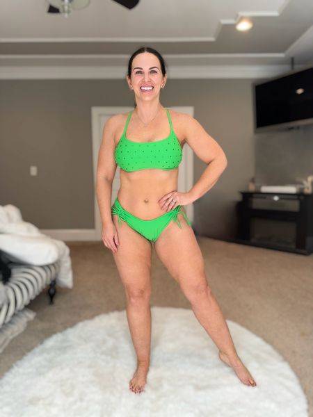 This color is amazing! This bralette top suit and low rise bottom is sporty and fun. It does seem to run smaller so I recommend sizing up. Shown in a Large but exchanging it for XL. (jr sizing)

#LTKover40 #LTKmidsize #LTKswim