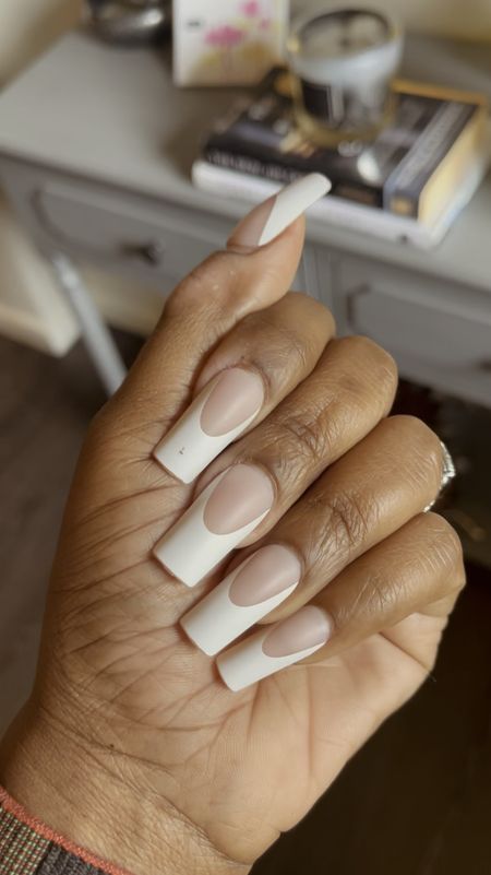 Another set of press on nails. This modern French set by Salon Perfect is a great impression of the long classic French tip. #pressonnails #walmart 


#LTKVideo #LTKbeauty
