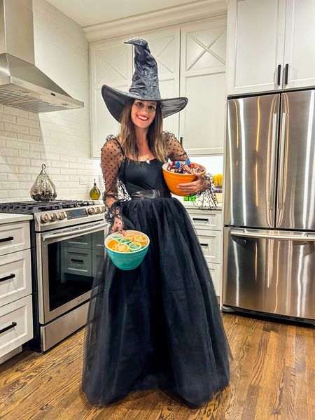 Easy Amazon witch costume!  This tulle skirt, top, and witch hat are all on Amazon!  This made for a quick and easy costume, and you can never go wrong with the classic witch costume!  We hand out candy for the kiddos and Jell-O shots for the moms and dads!  

#LTKSeasonal #LTKstyletip #LTKfindsunder50