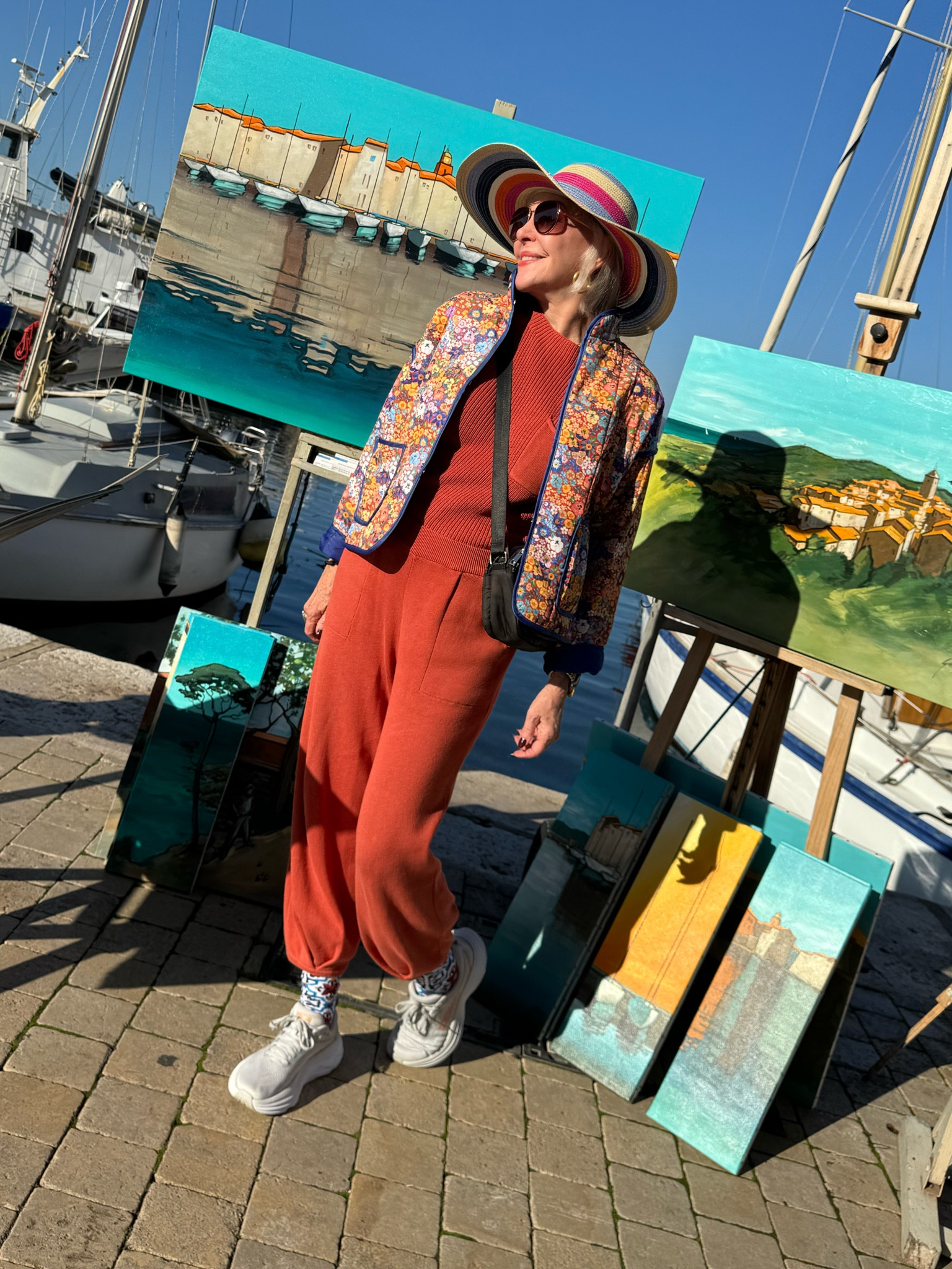 Cropped lightweight puffer floral jacket It runs big so size down I am wearing a size small 
Loungewear knit set with sleeveless top. This Comes in other colors. I wear a size medium. 
My Hoka sneakers are my go to walking and workout shoe. Great outfit for travel 


#LTKFindsUnder50 #LTKOver40 #LTKSeasonal