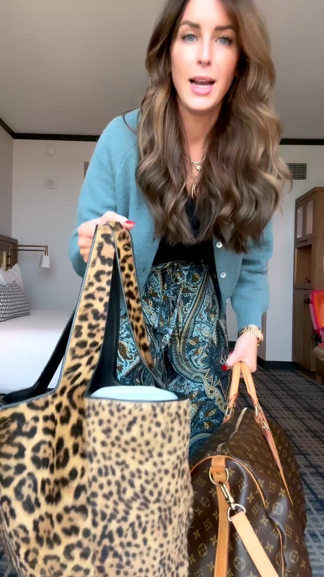 Dallas bound for a work week and bringing all the good things with me! These Ulla Johnson pants are so beautiful and comfortable for travel—I’m wearing a small, styled with a great navy tank and DÔEN cashmere cardigan, also both size small. My Prada wedges are from last season, but I linked my exact pair plus the newer version I love just as much.

And the bags! Leopard is a neutral, so of course this favorite YSL came along to hold everything I need during the conference. My secondhand Louis Vuitton travel bag comes with me on every single trip—and this time, it’s filled with even more bags. A new Savette and Jacquemus, an old Fendi I’m so happy to bring back out, plus the red Valentino and silver Chanel I bought last year. The silver Chanel is already coming out to play tonight!

Tap to shop all the pieces from my Dallas travel look!

#LTKootd #LTKOver40 #LTKTravel